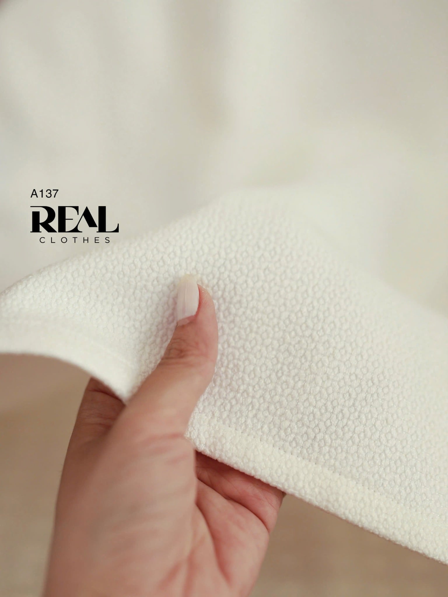 Áo cổ tròn mè trắng