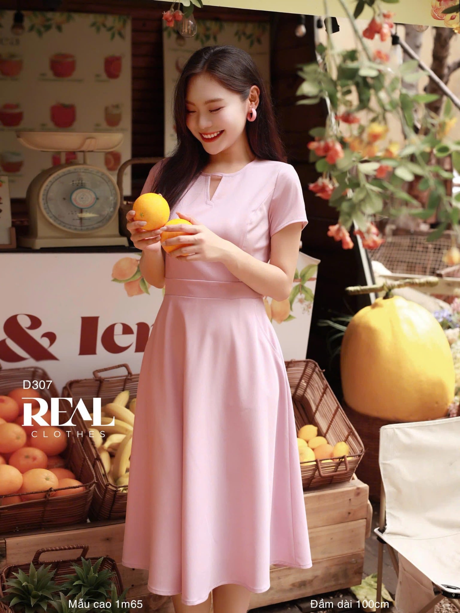 Đầm cổ tròn cách điệu hồng