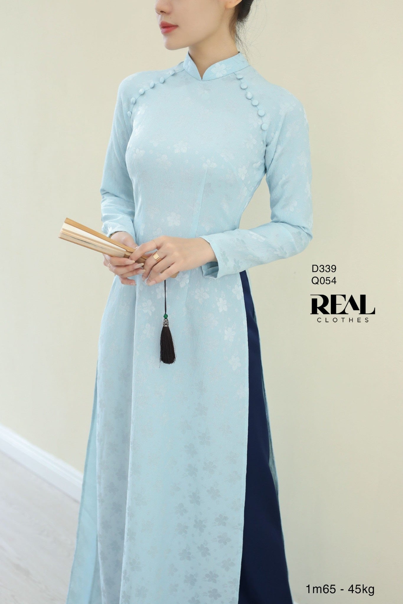 Áo dài truyền thống Nhã An lụa lam tay dài