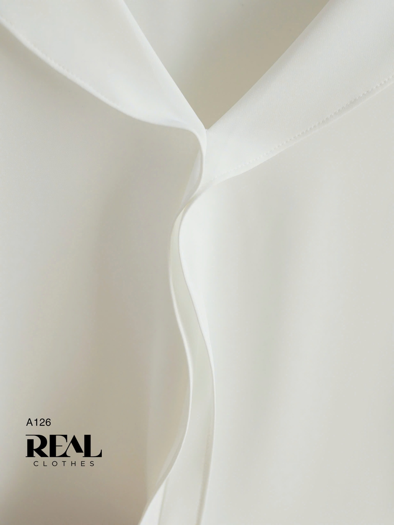 Áo cổ lật trắng