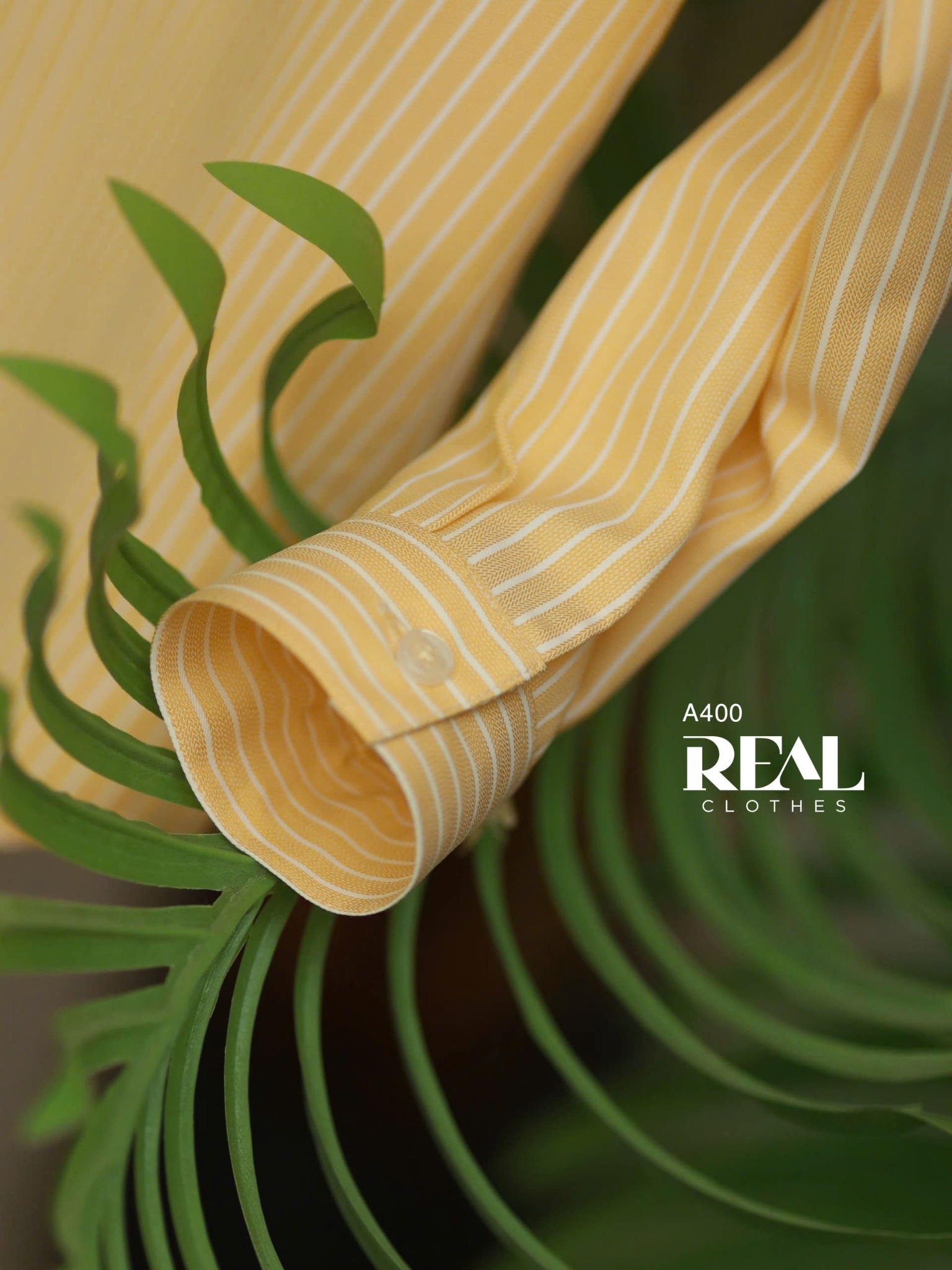 Sơ mi túi sọc vàng