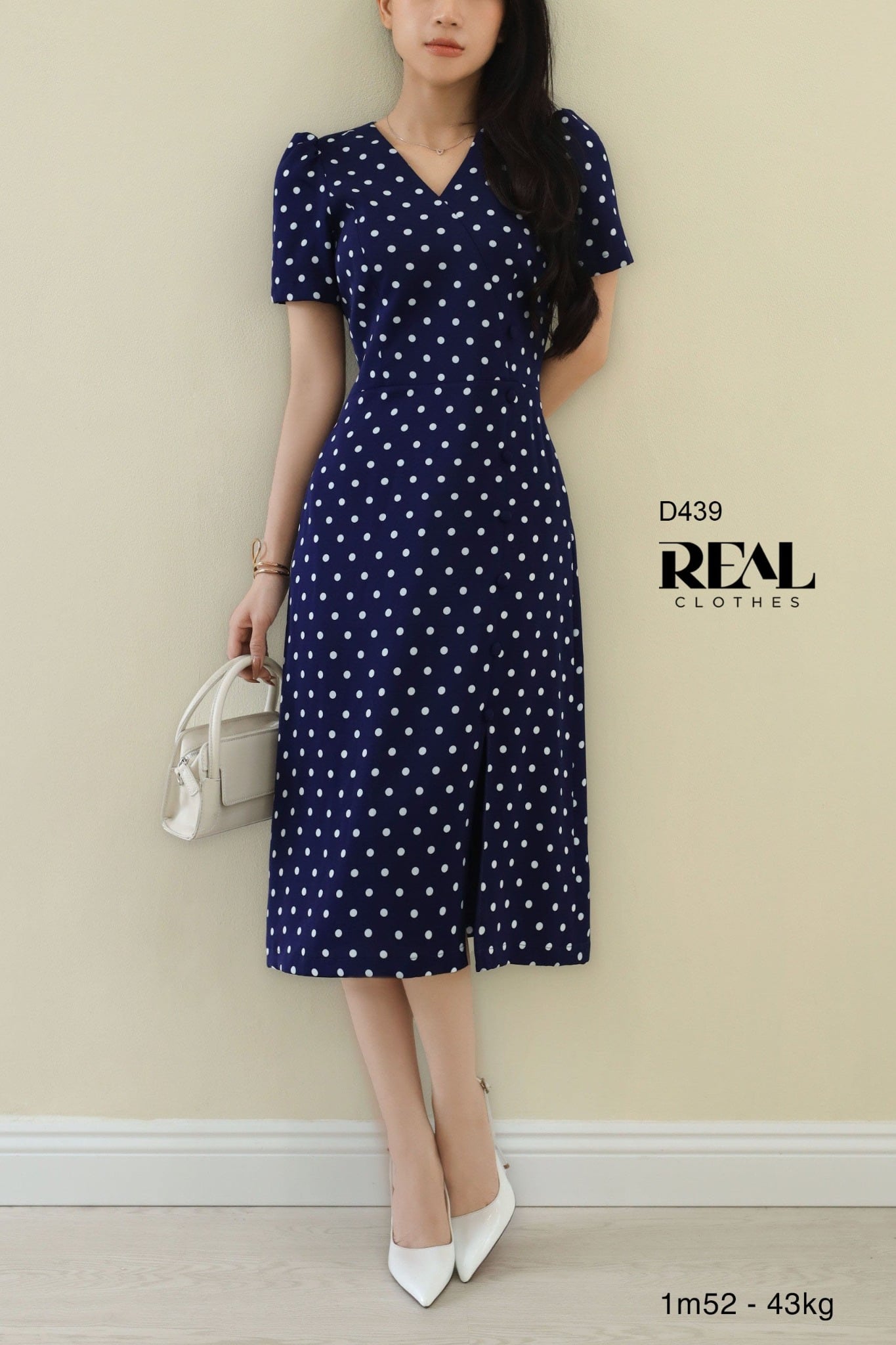 Đầm chéo chấm bi xanh SALE - size XS