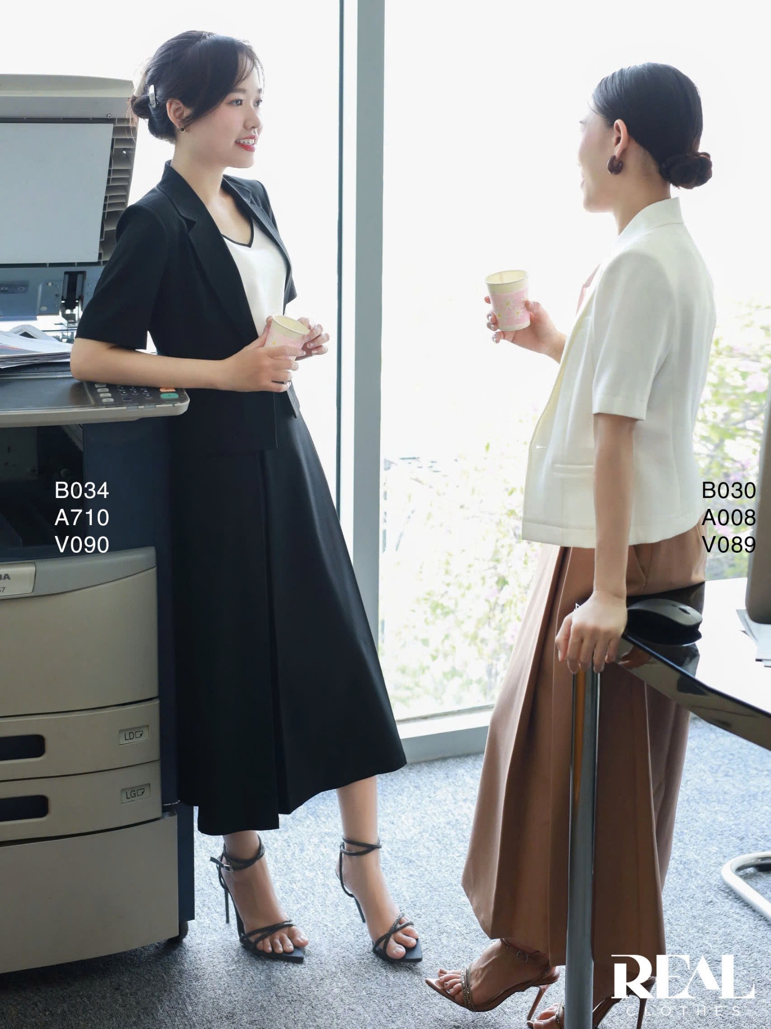 Váy 2 xếp nút đen SALE