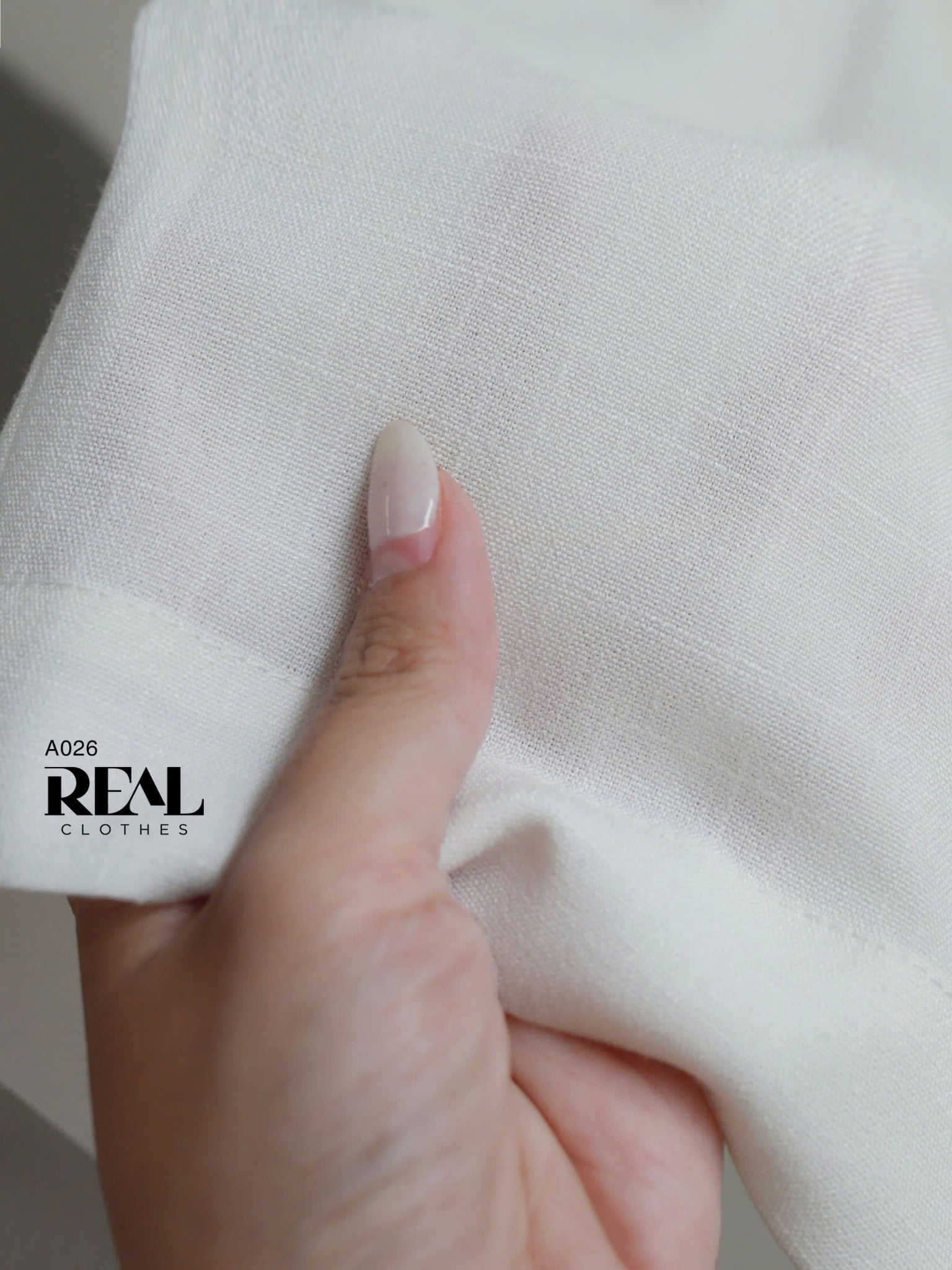 Áo cánh dơi linen trắng