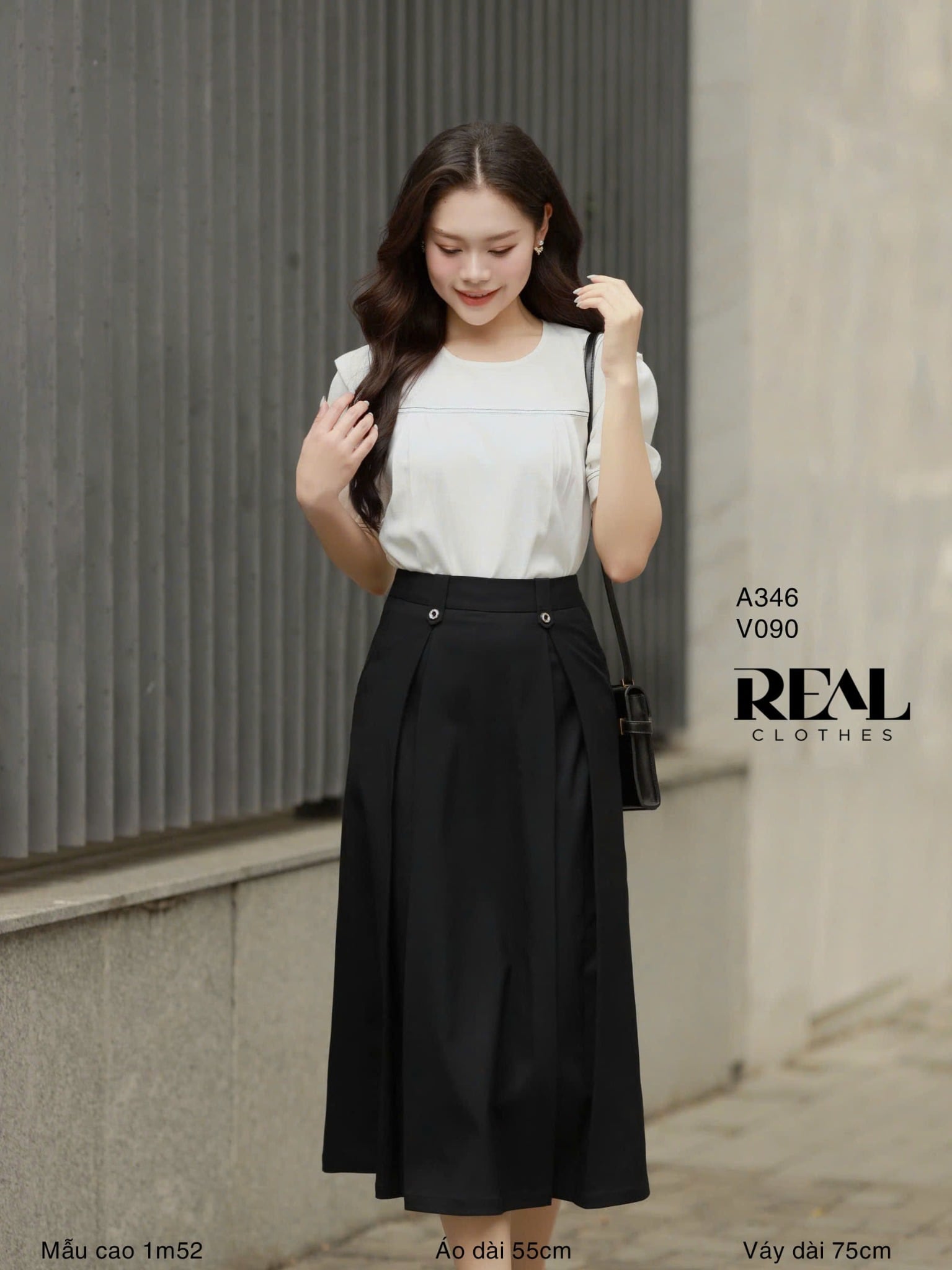  Váy 2 xếp nút đen 