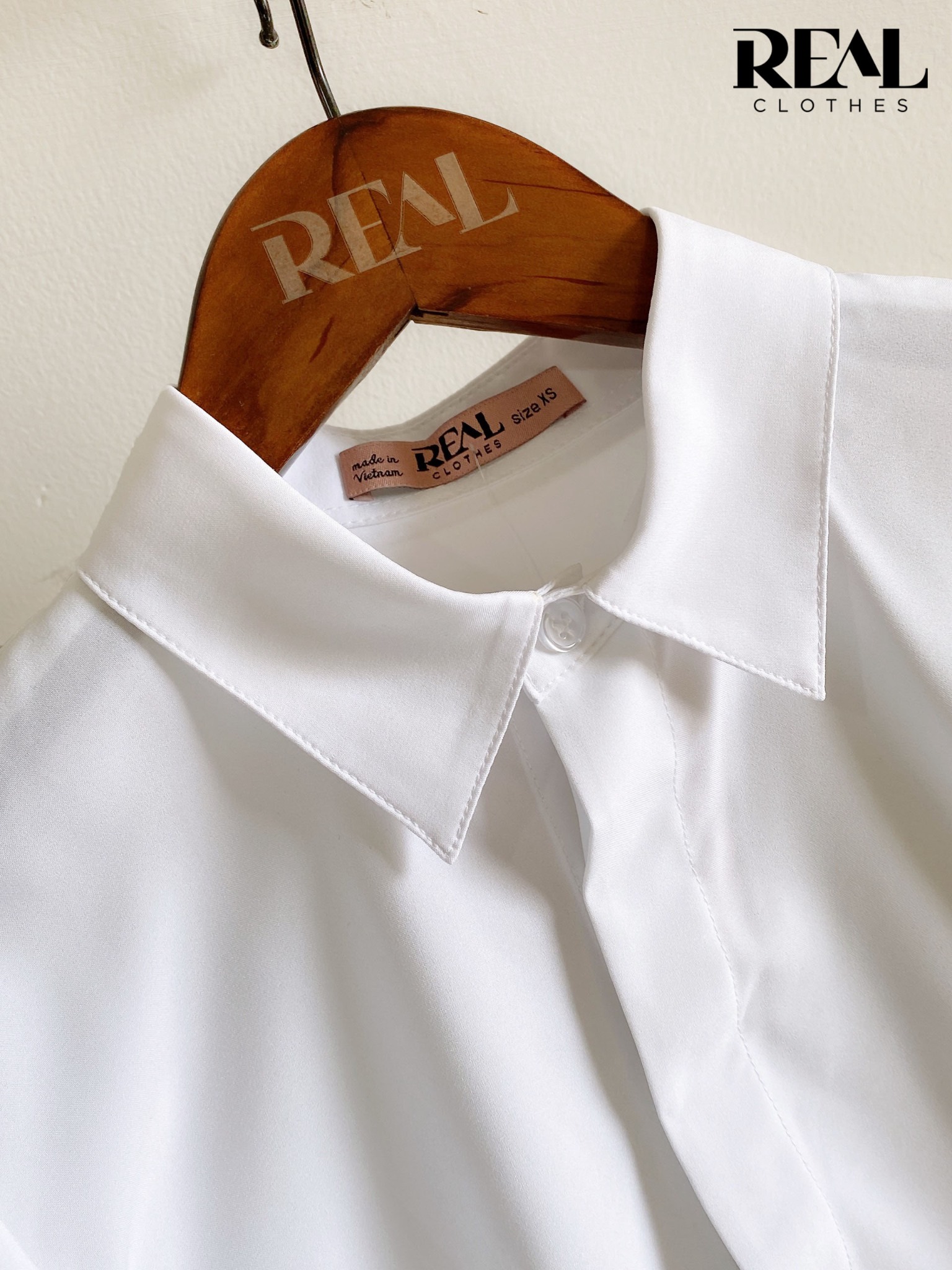 Sơ mi chít eo nano trắng