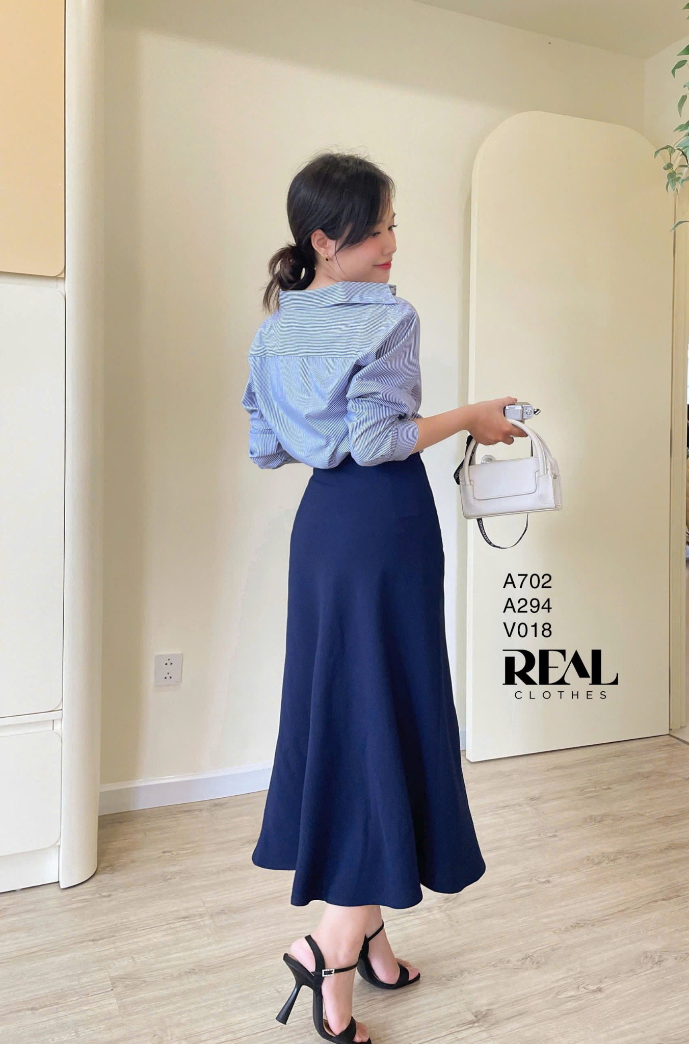 Sơ mi form rộng sọc xanh SALE