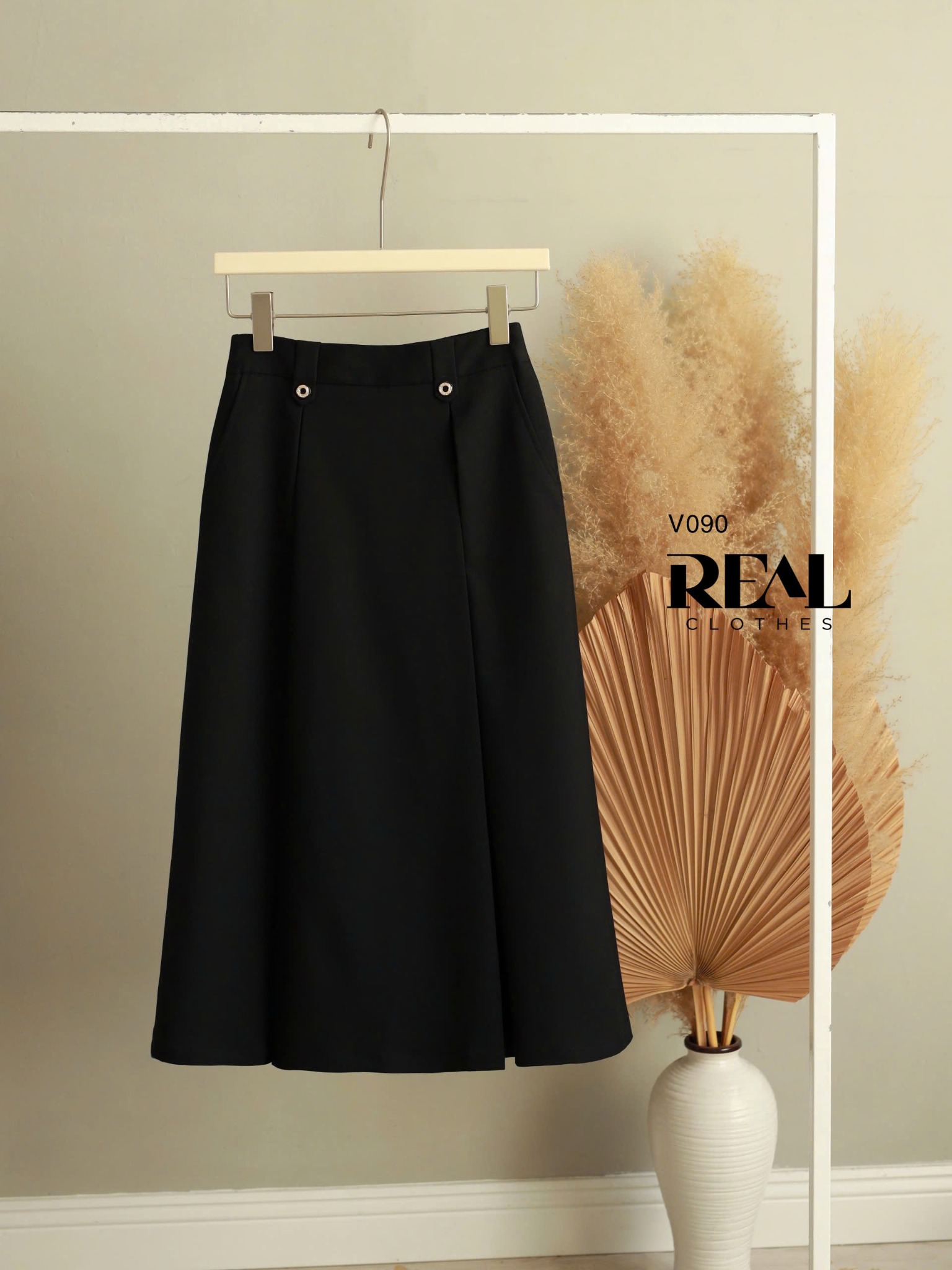 Váy 2 xếp nút đen SALE