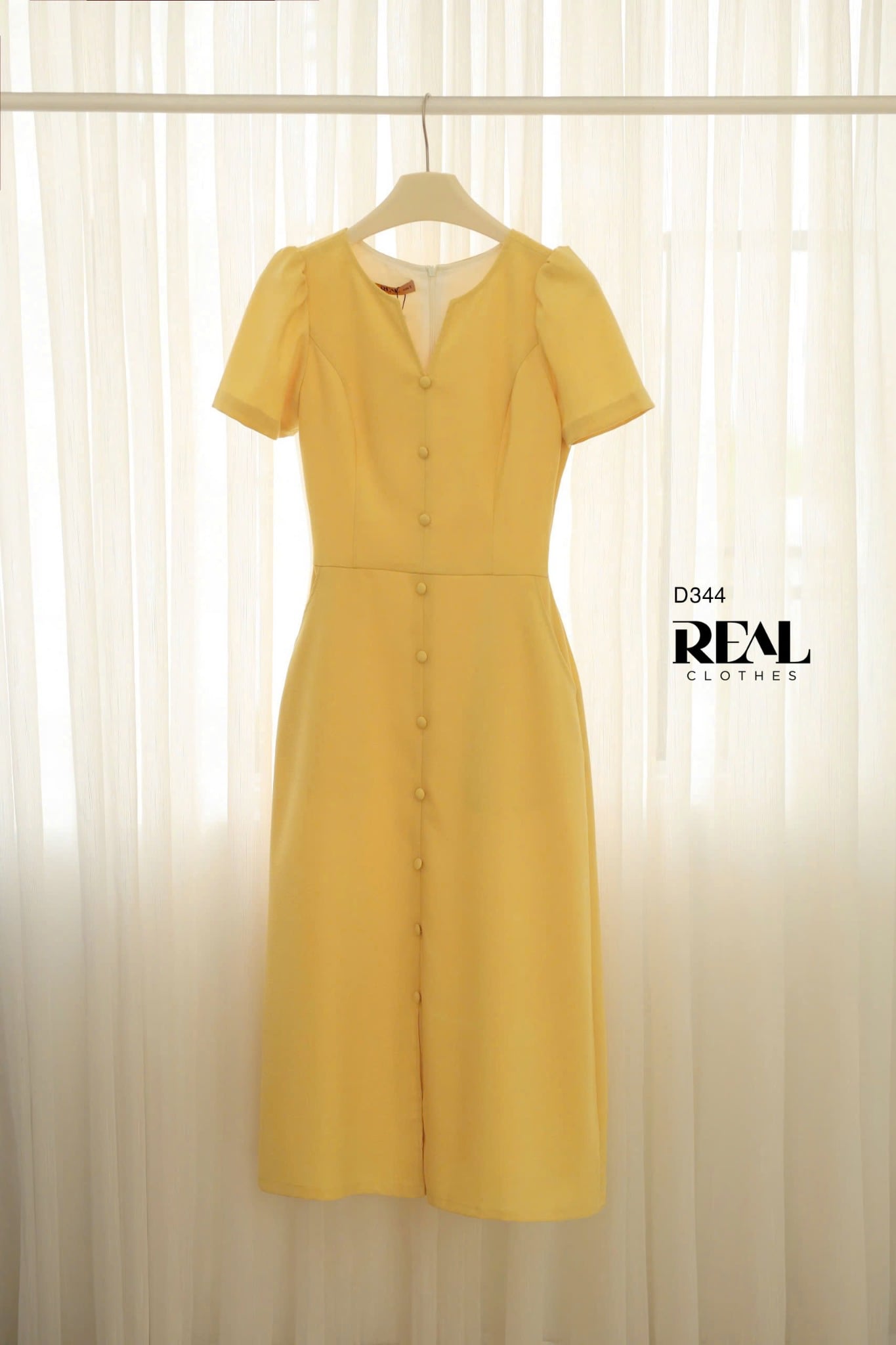 Đầm london linen vàng