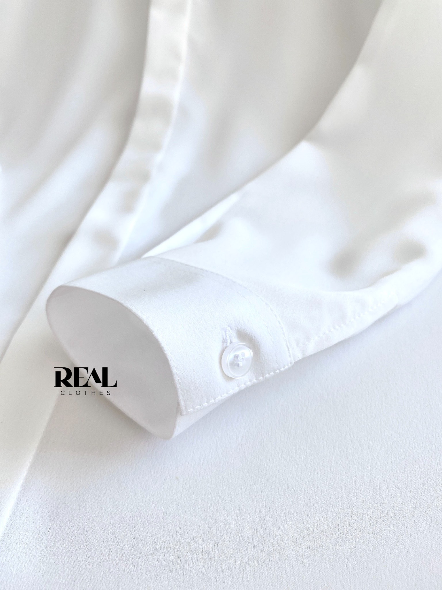 Sơ mi cổ mềm trắng