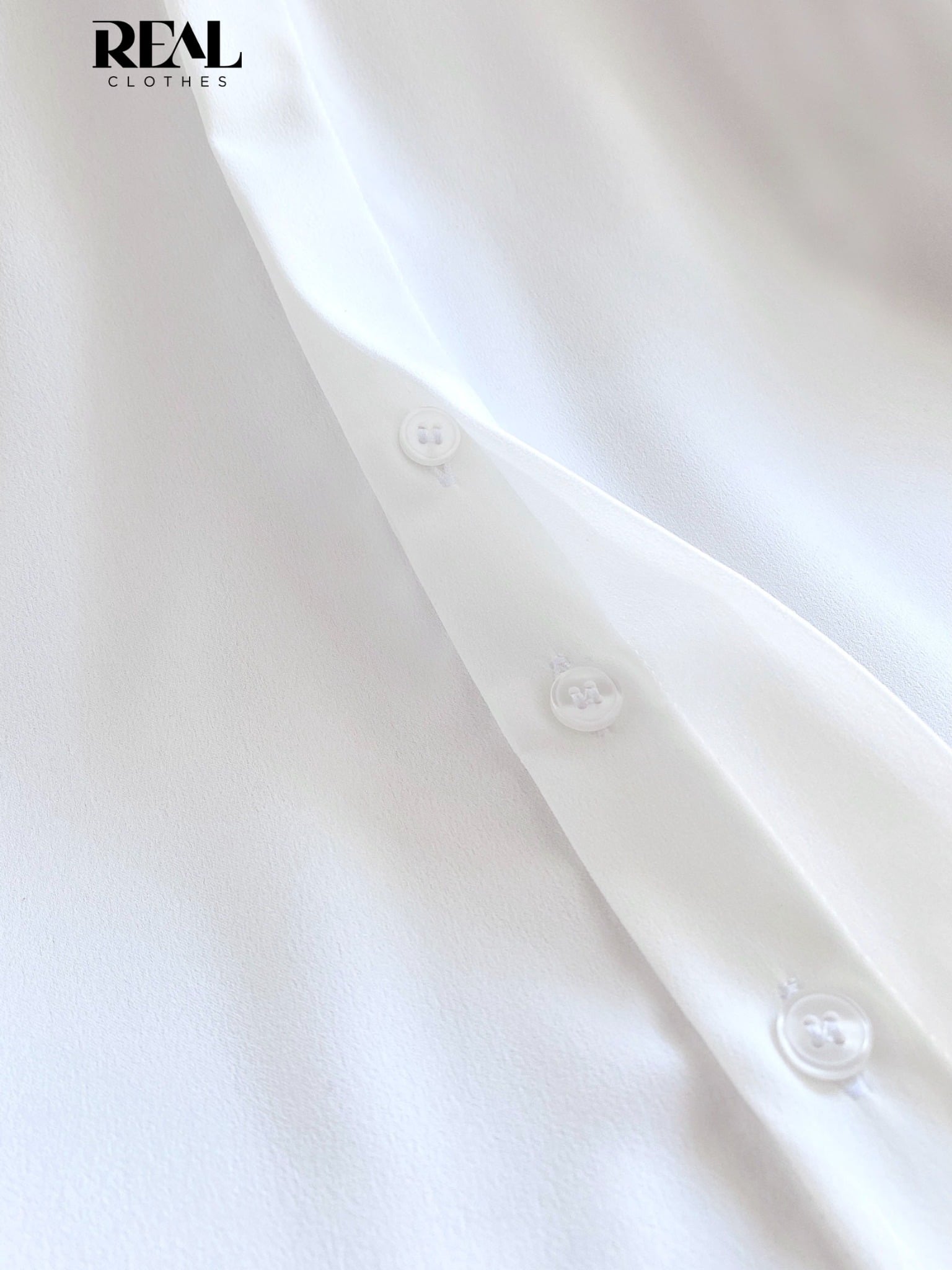 Sơ mi cổ mềm trắng