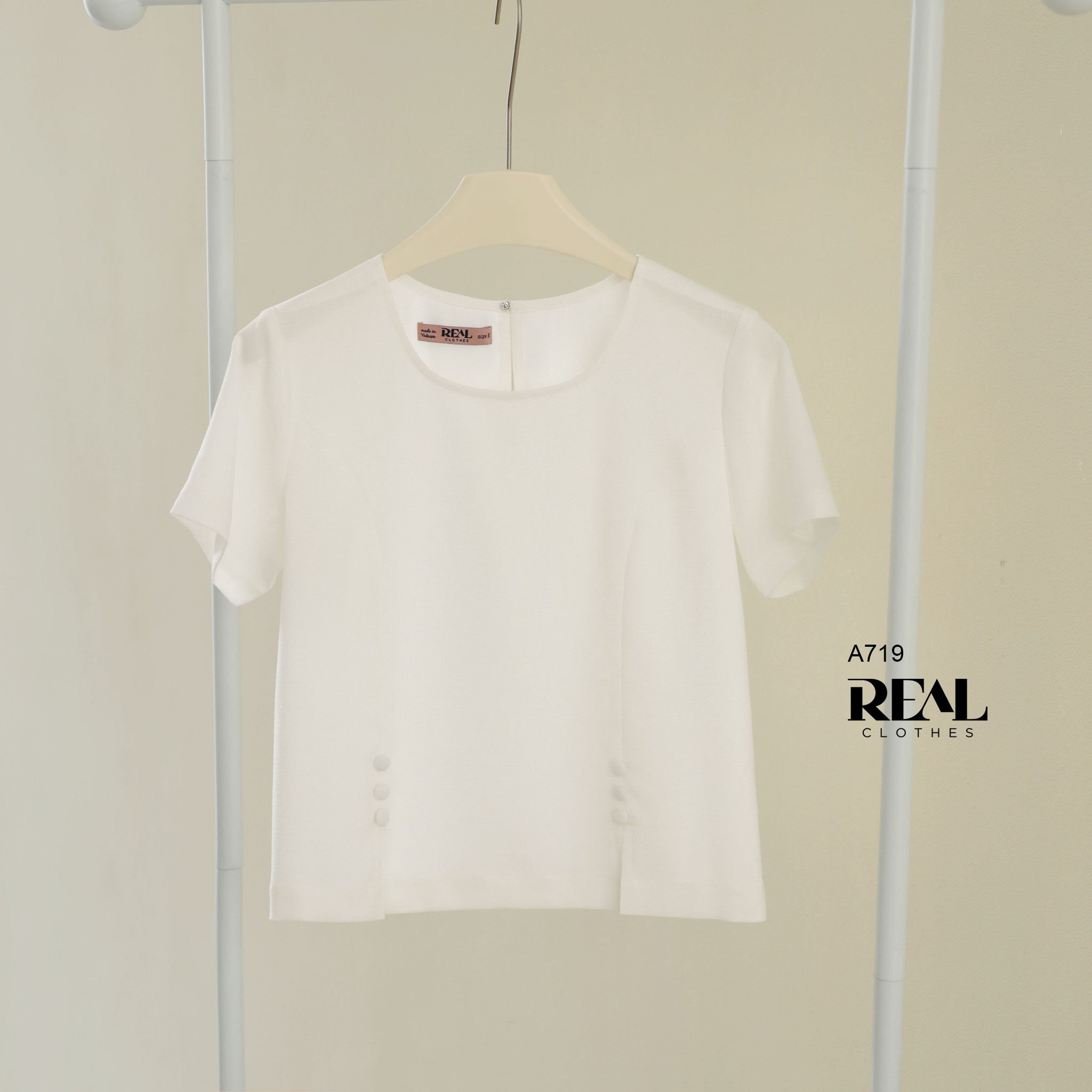 Áo xẻ tà linen trắng SALE