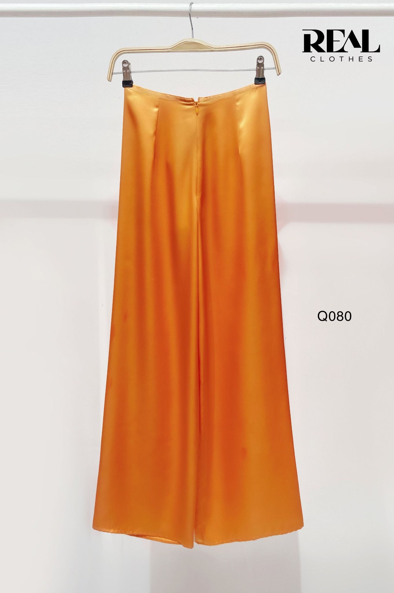 Áo dài form suông lụa hà đông xanh lá phối quần váy