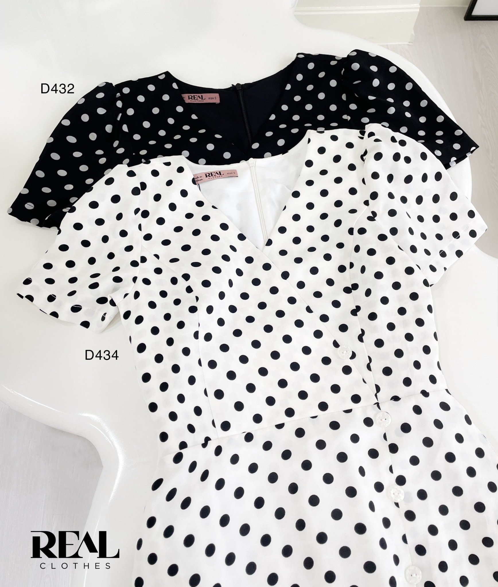 Đầm chéo chấm bi đen SALE