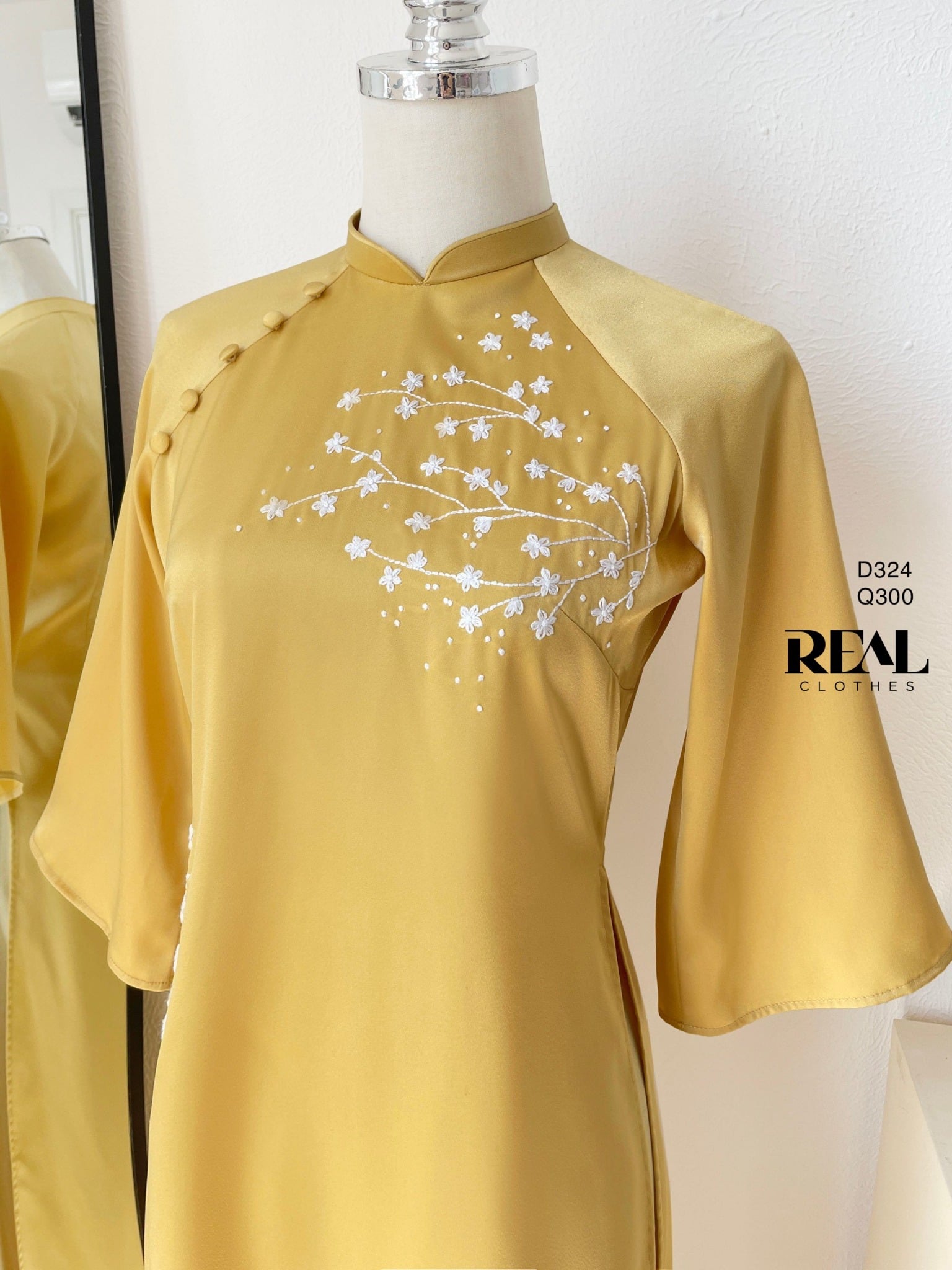 Áo dài cách tân vivi vàng