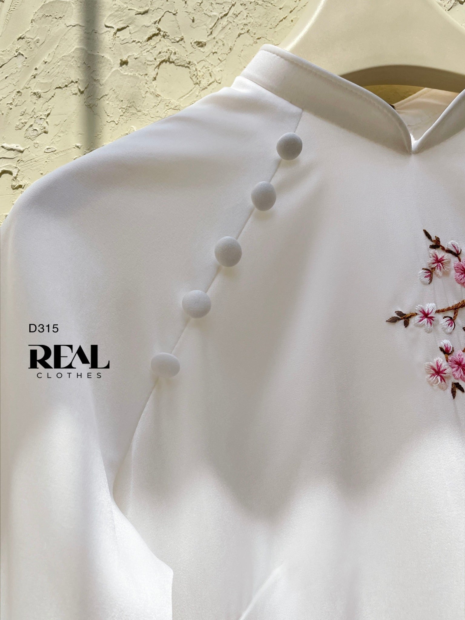 Áo dài cách tân Vivi trắng hoa mận