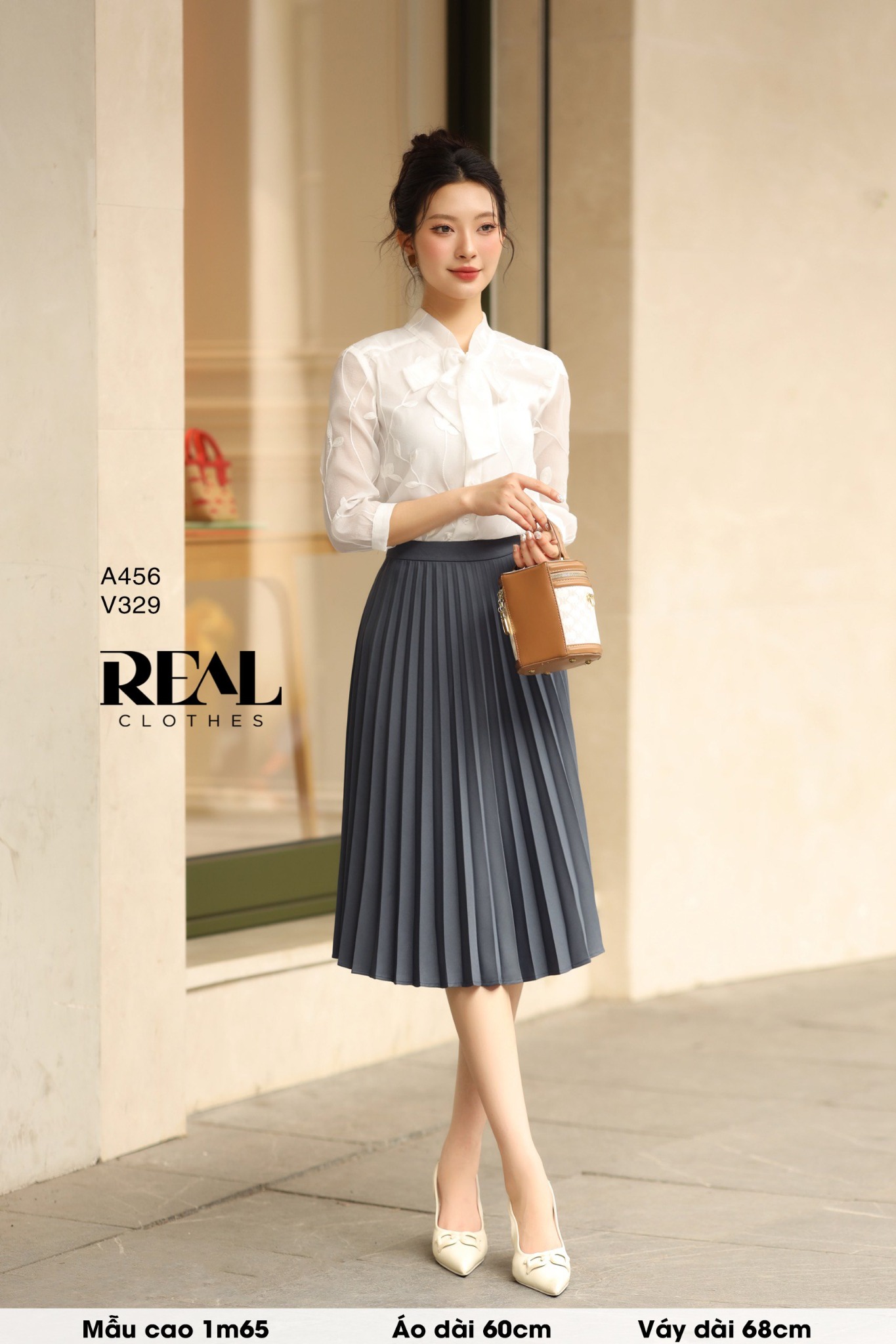 Blazer cổ tròn cindy đen