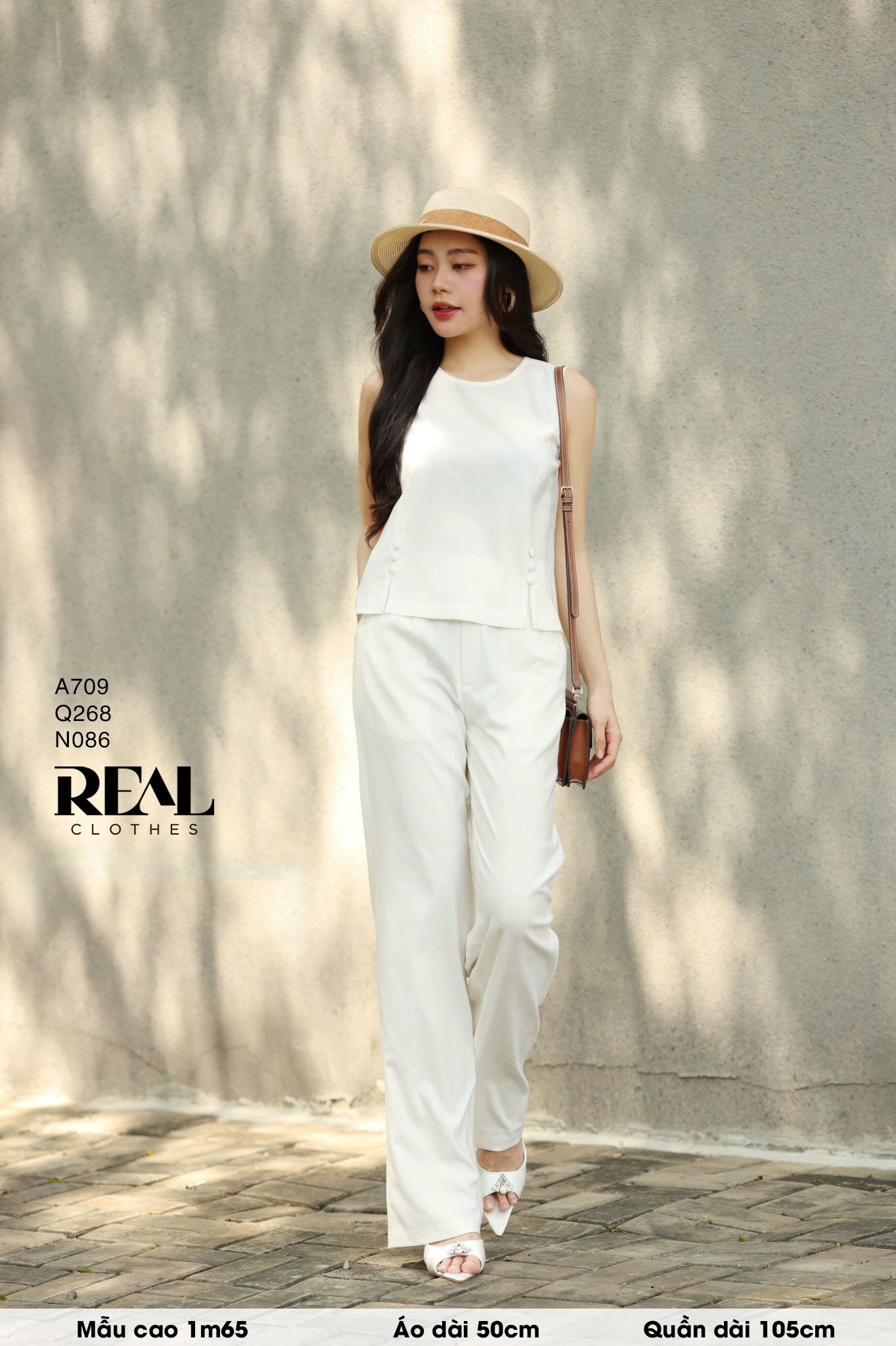 Áo xẻ tà linen trắng không tay SALE