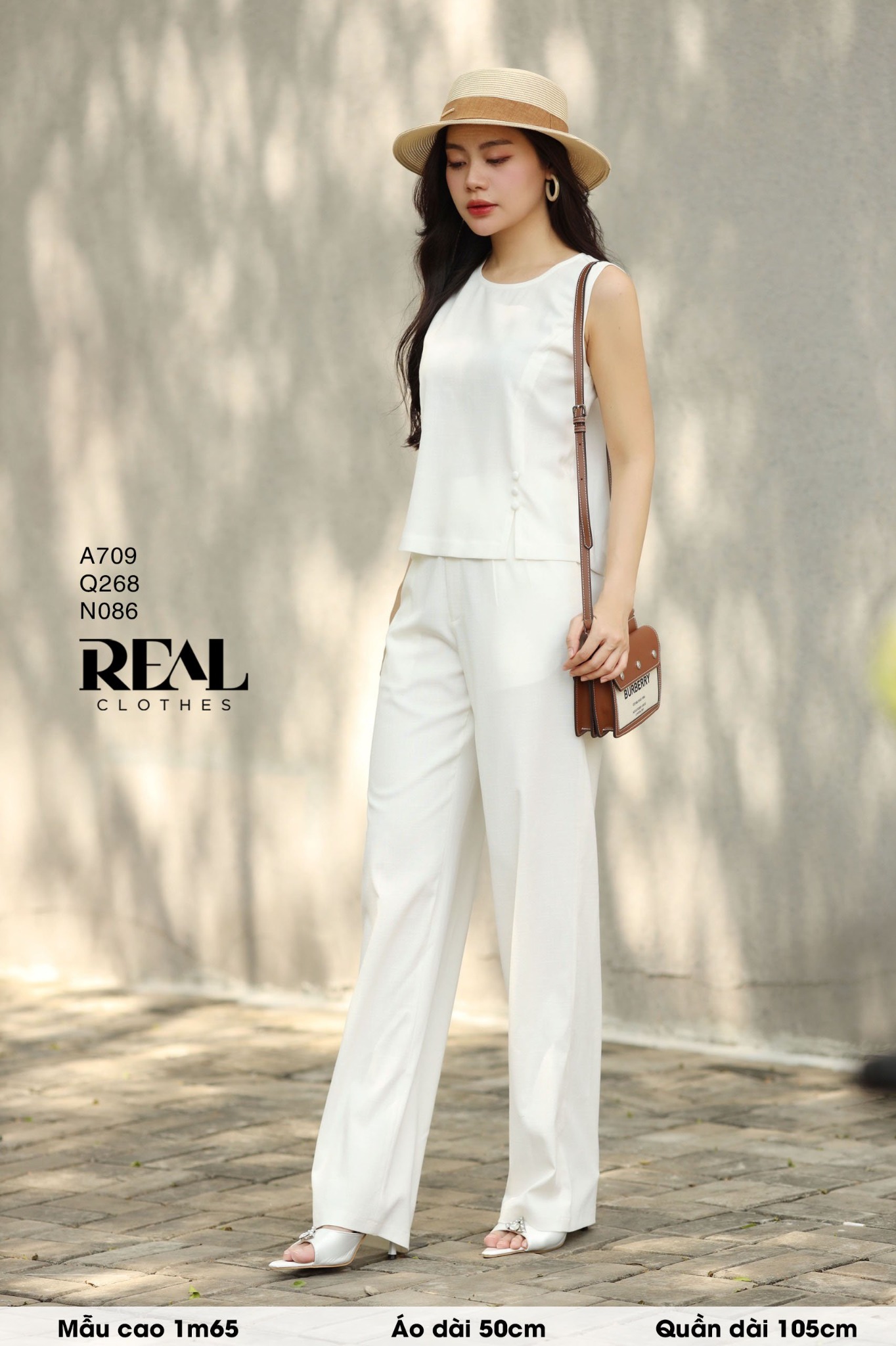 Áo xẻ tà linen trắng không tay SALE