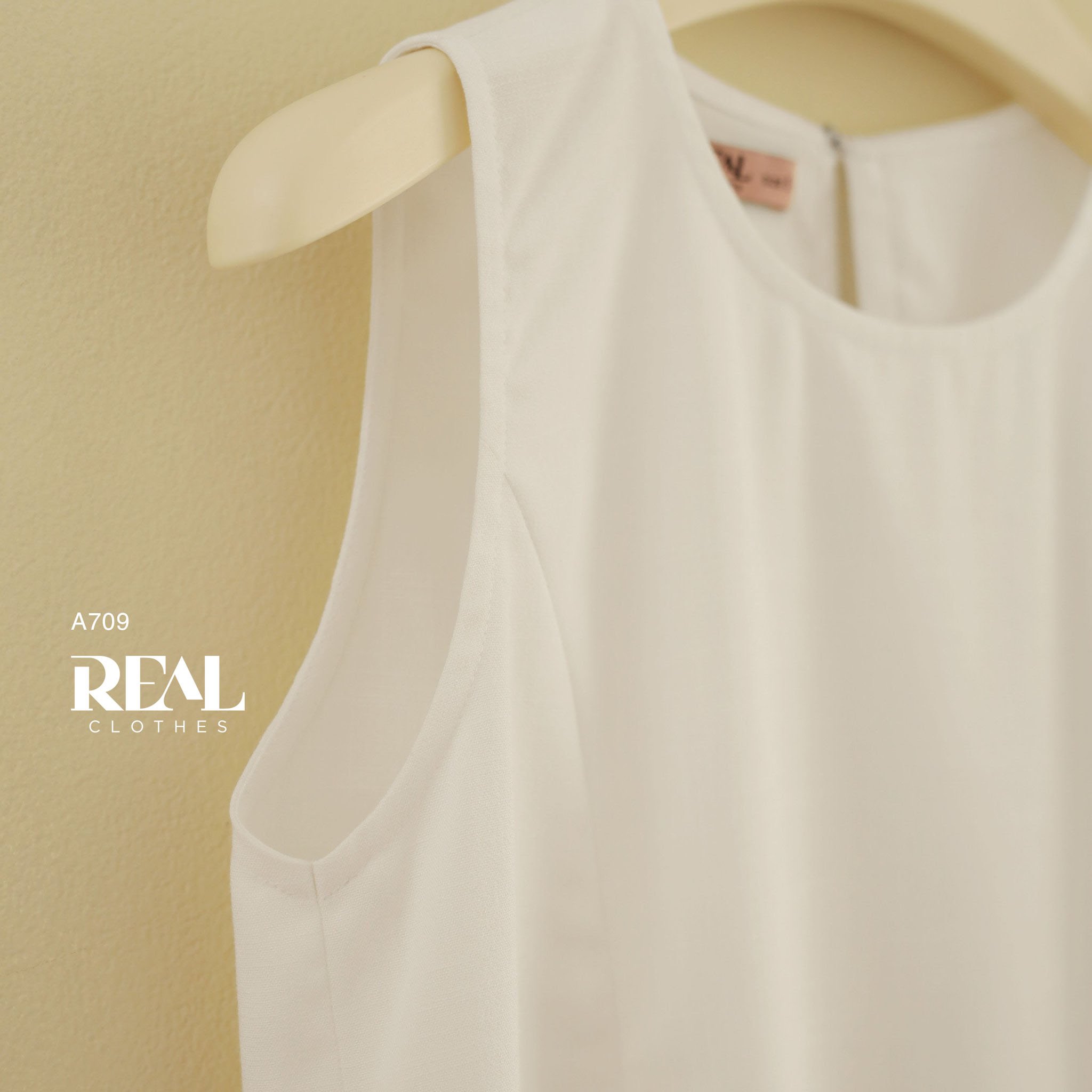 Áo xẻ tà linen trắng không tay SALE