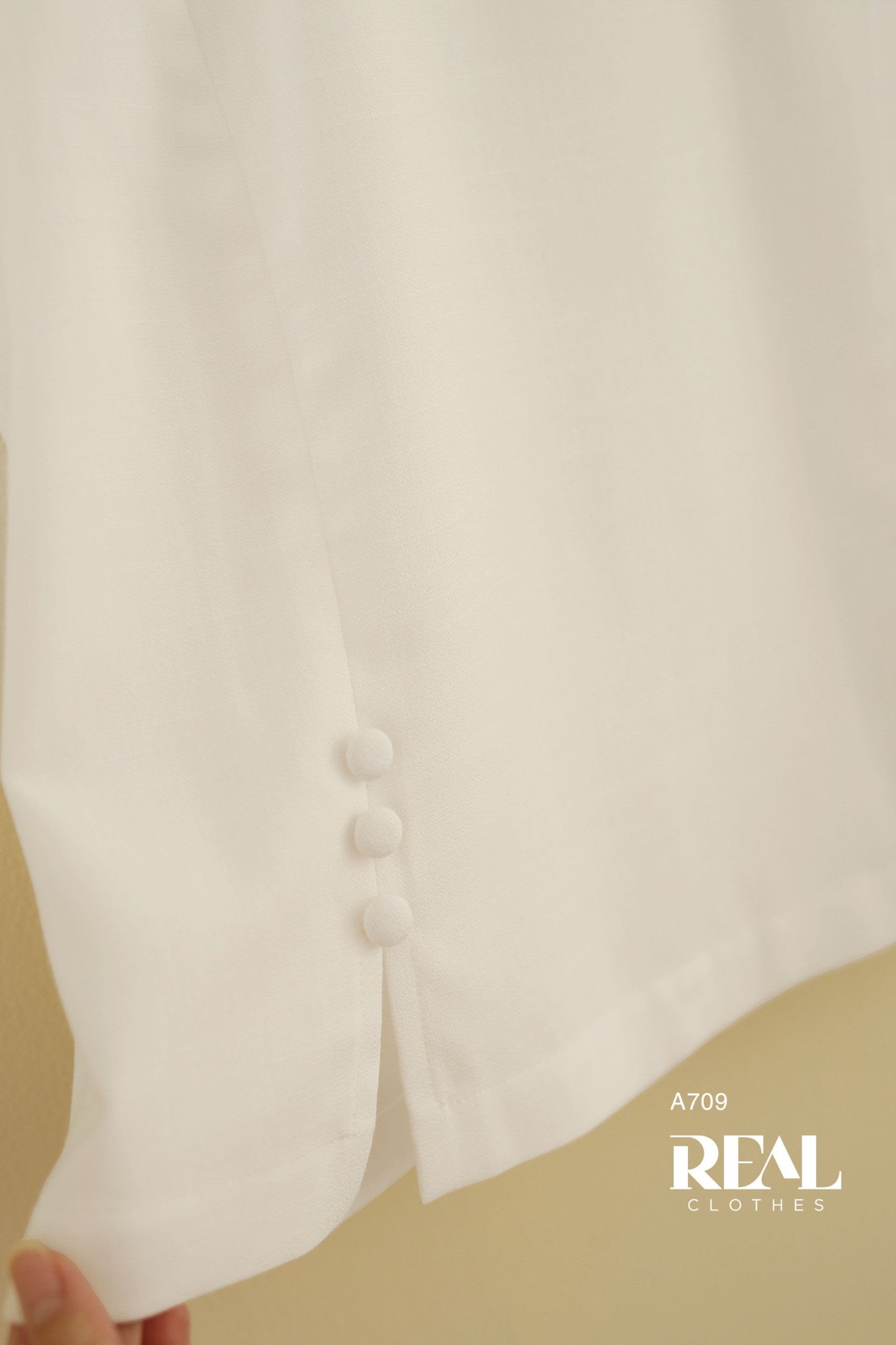 Áo xẻ tà linen trắng không tay SALE