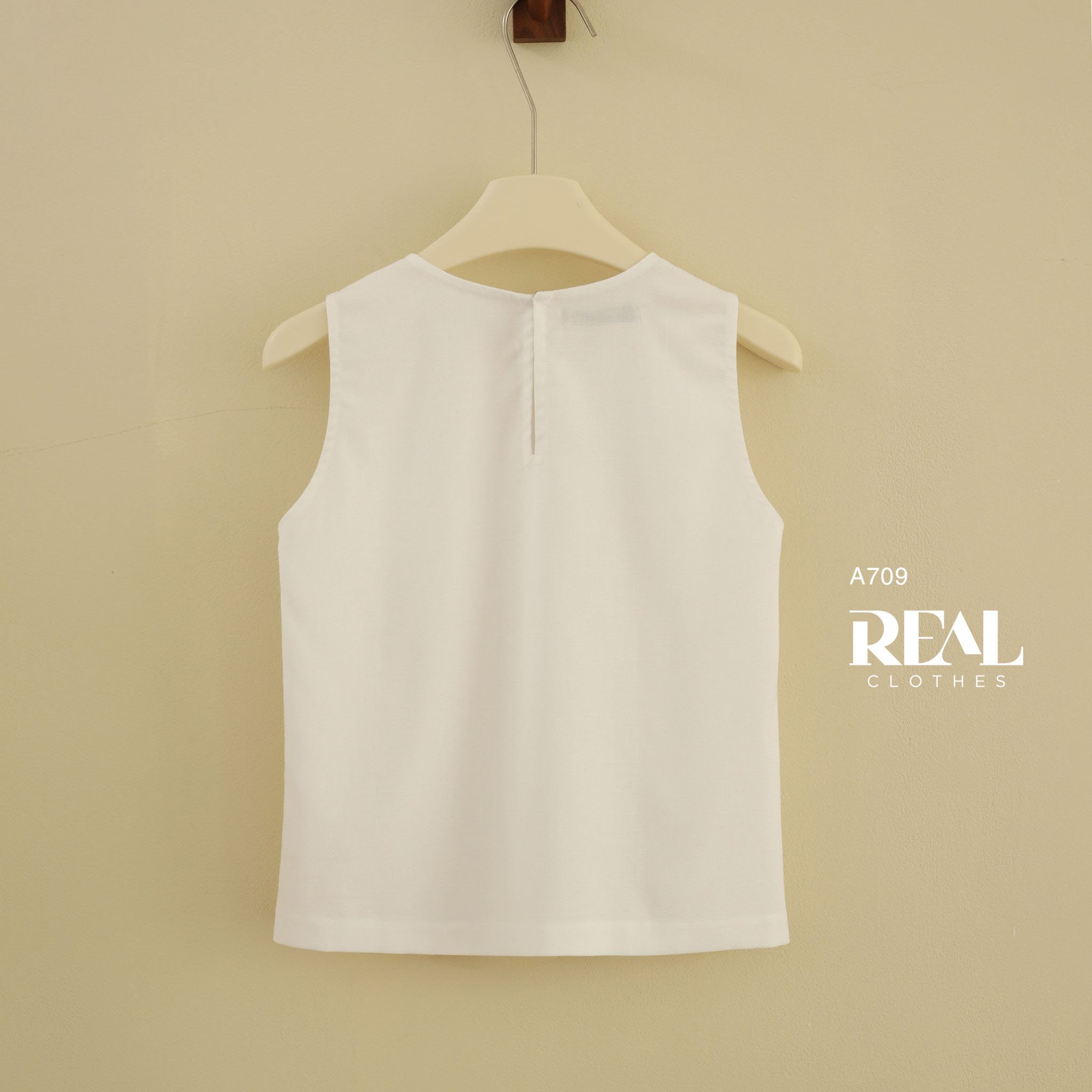 Áo xẻ tà linen trắng không tay SALE