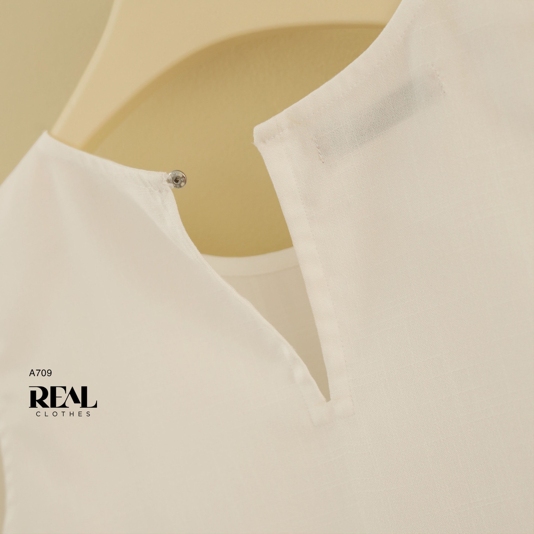 Áo xẻ tà linen trắng không tay SALE