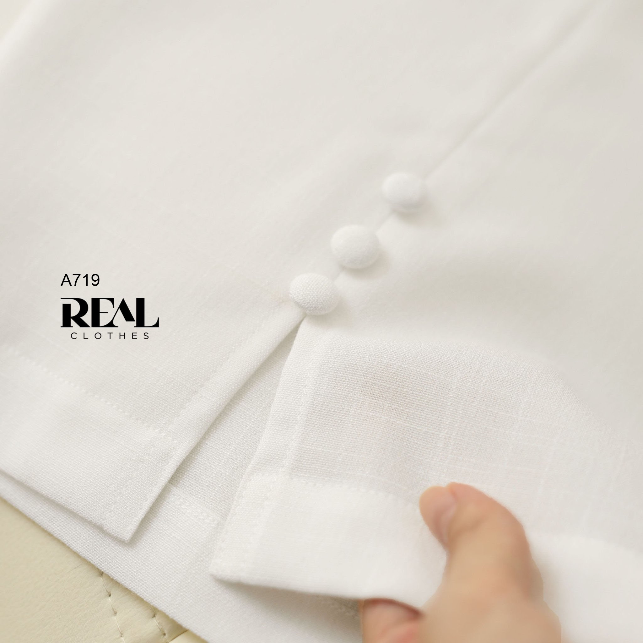 Áo xẻ tà linen trắng SALE