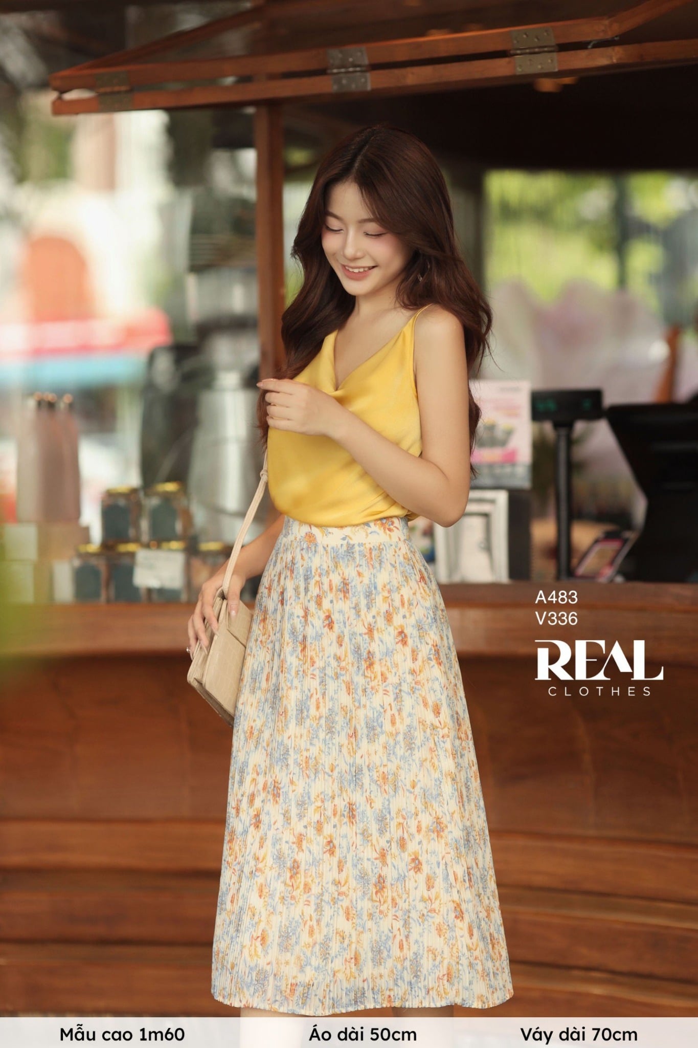 Váy dập li hoa cam FINAL SALE