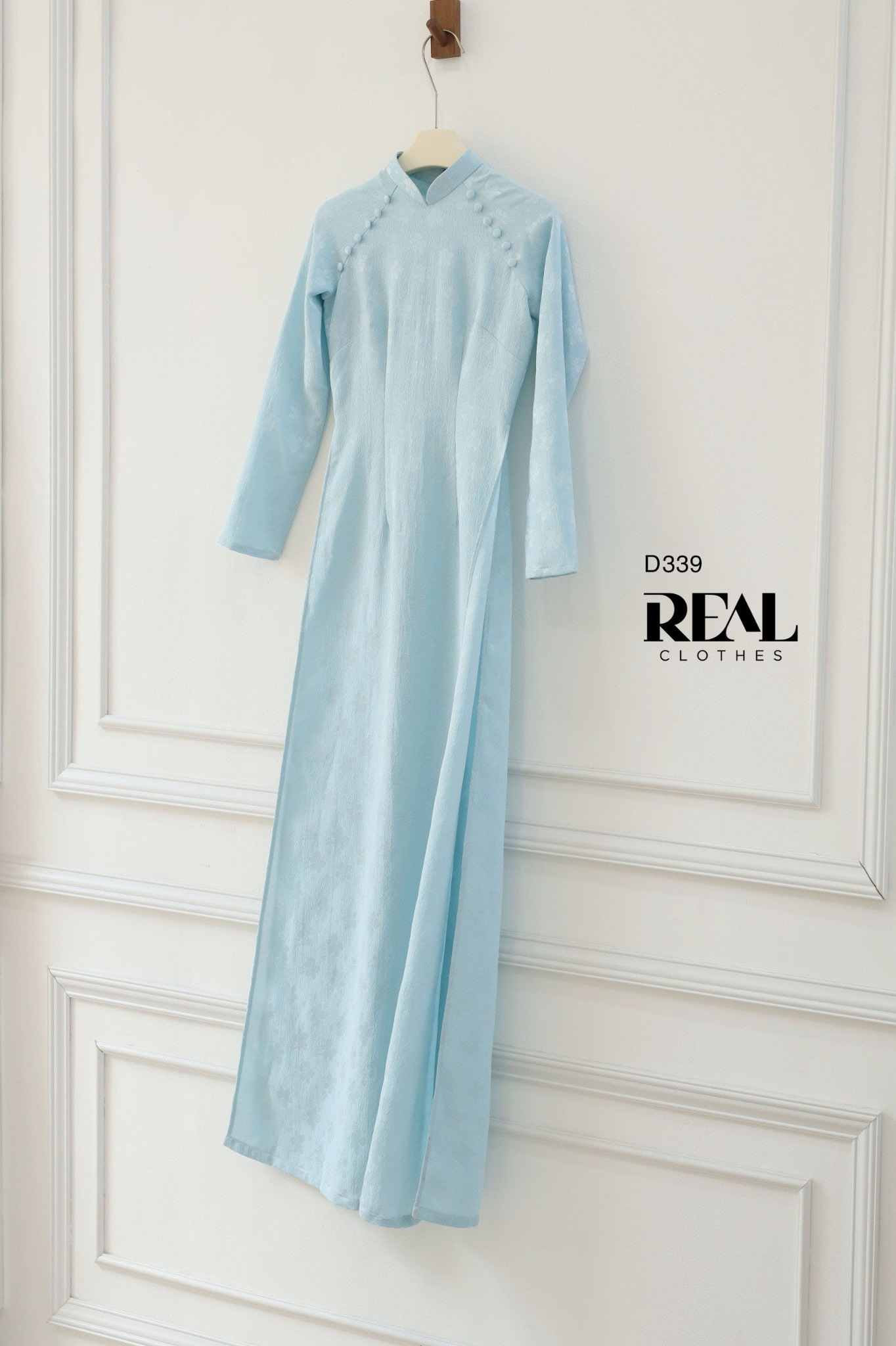 Áo dài truyền thống Nhã An lụa lam tay dài