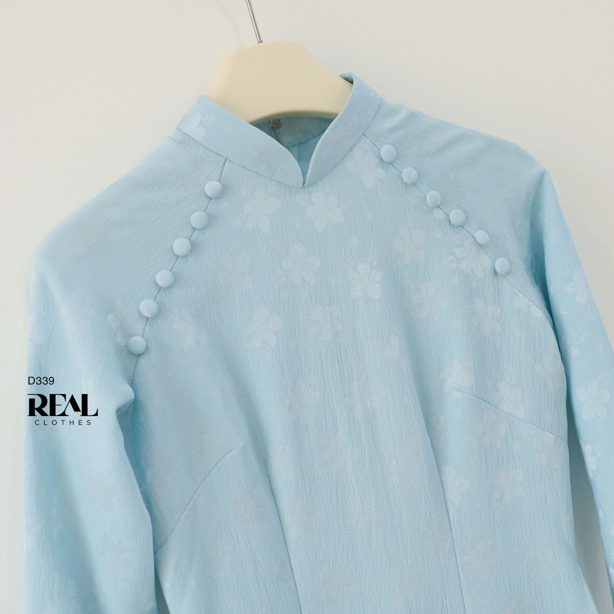 Áo dài truyền thống Nhã An lụa lam tay dài