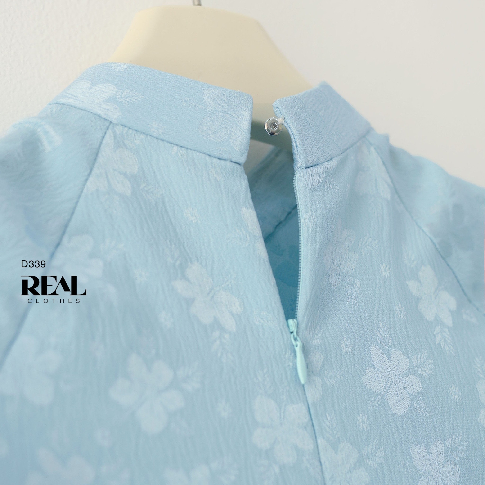 Áo dài truyền thống Nhã An lụa lam tay dài