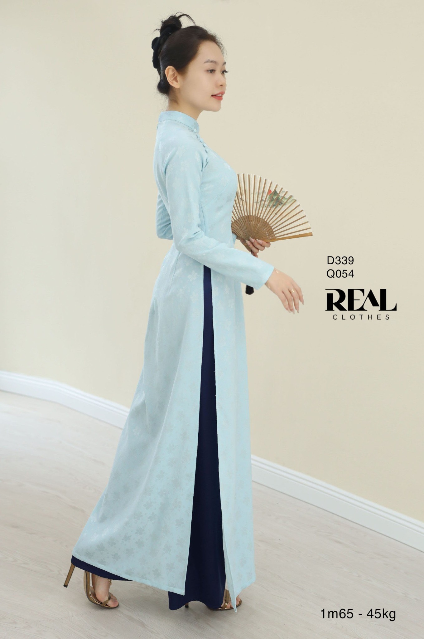 Áo dài truyền thống Nhã An lụa lam tay dài