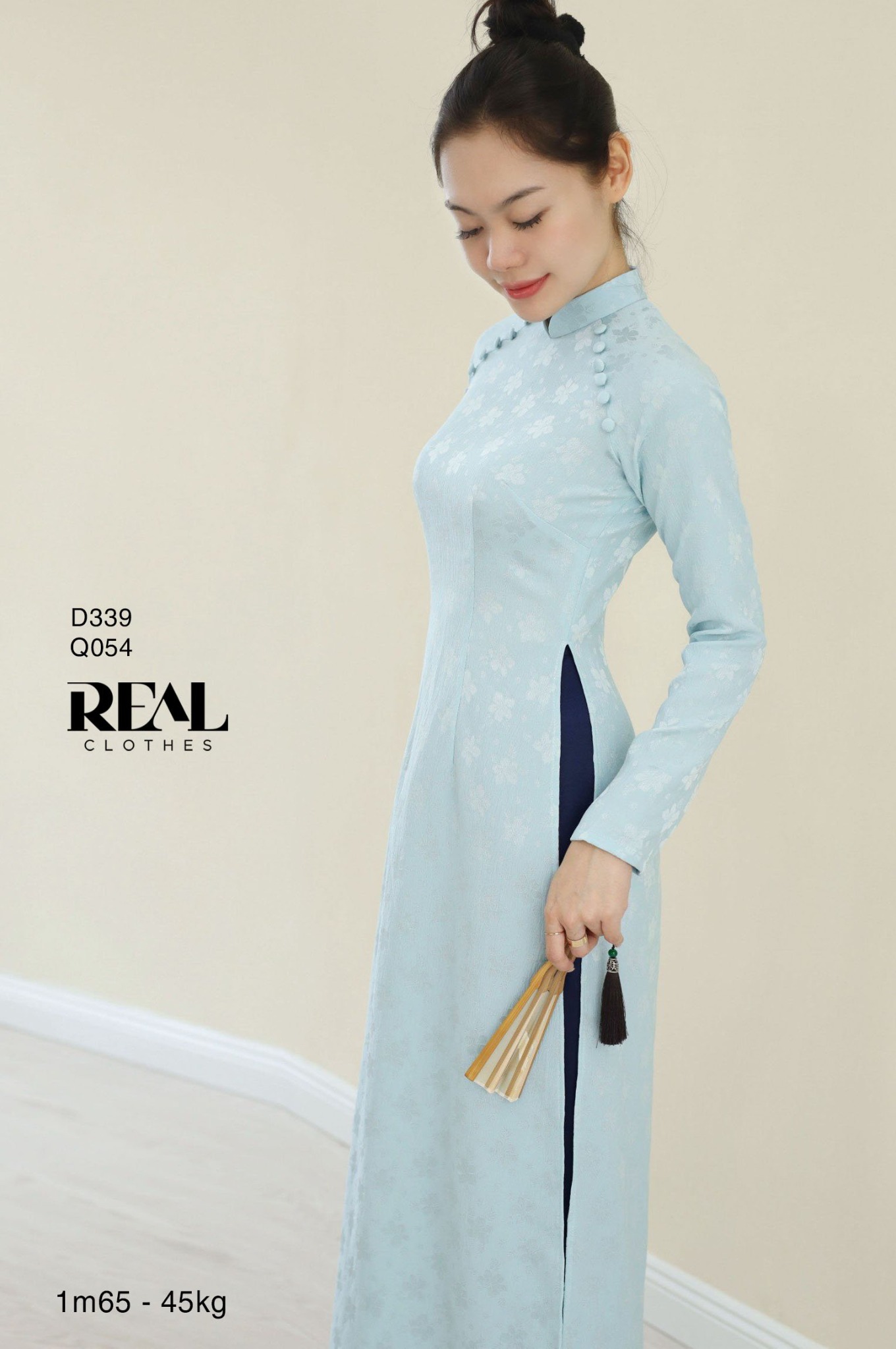 Áo dài truyền thống Nhã An lụa lam tay dài