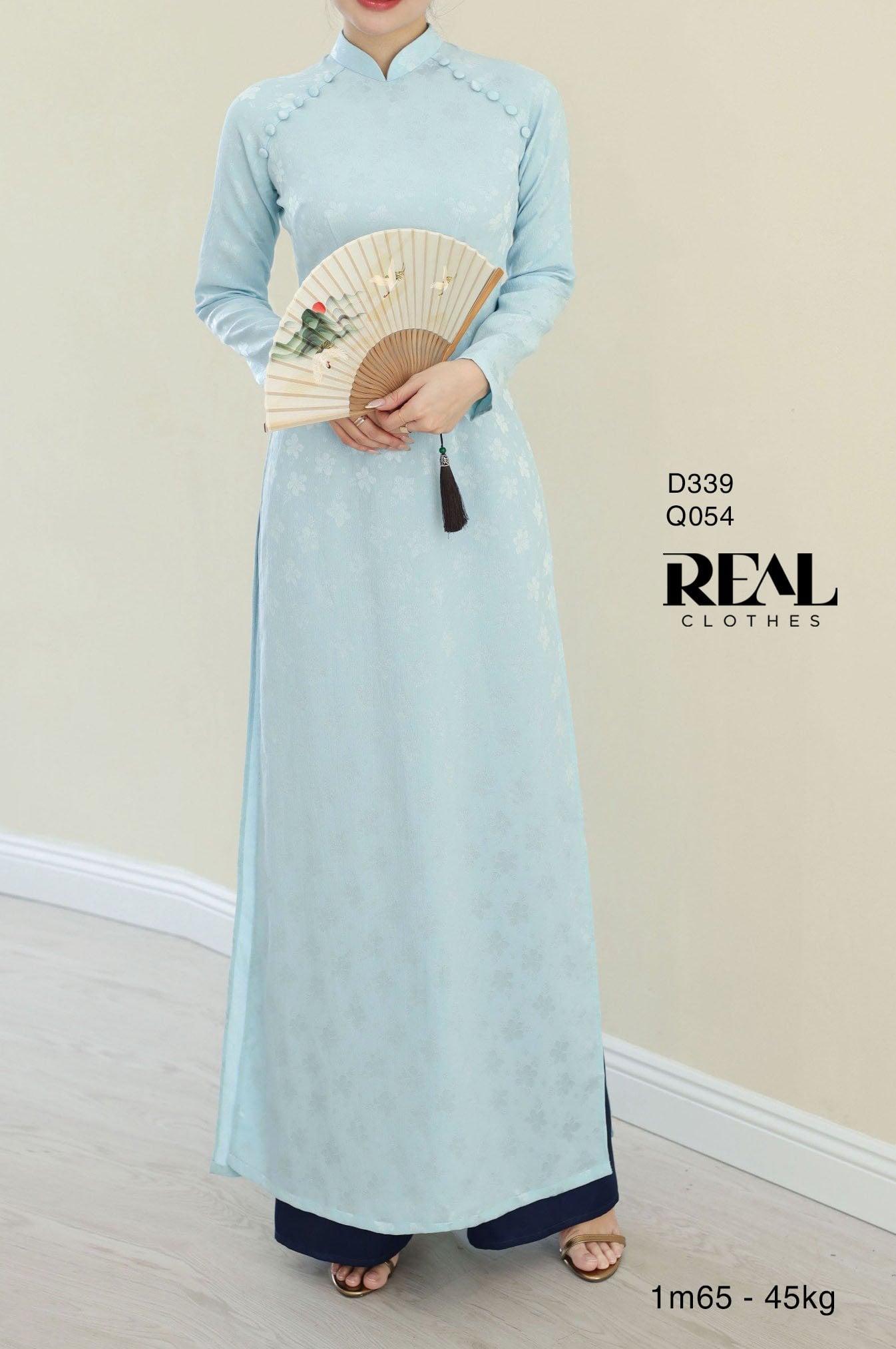 Áo dài truyền thống Nhã An lụa lam tay dài