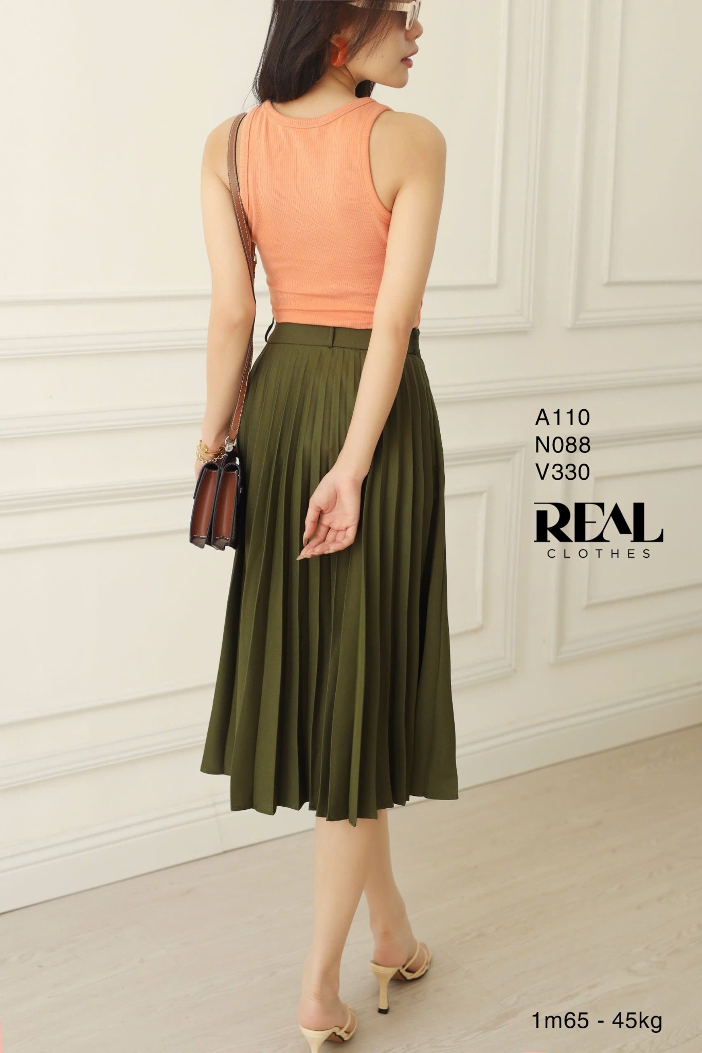 Áo tank top 3 lỗ cam SALE