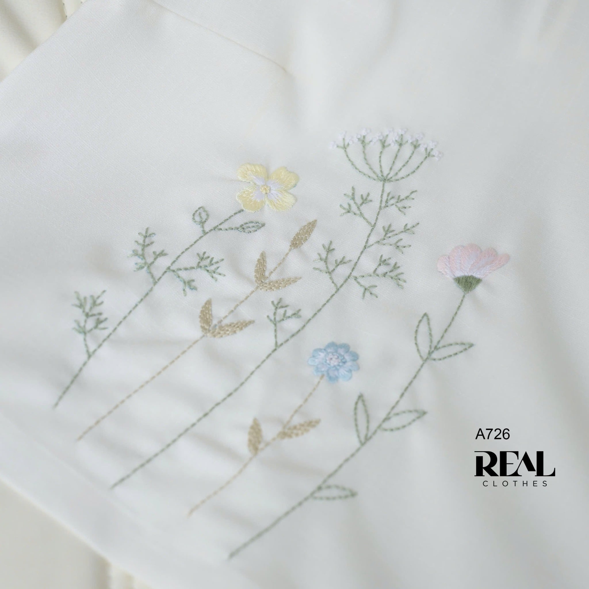 Áo linen trắng thêu tay