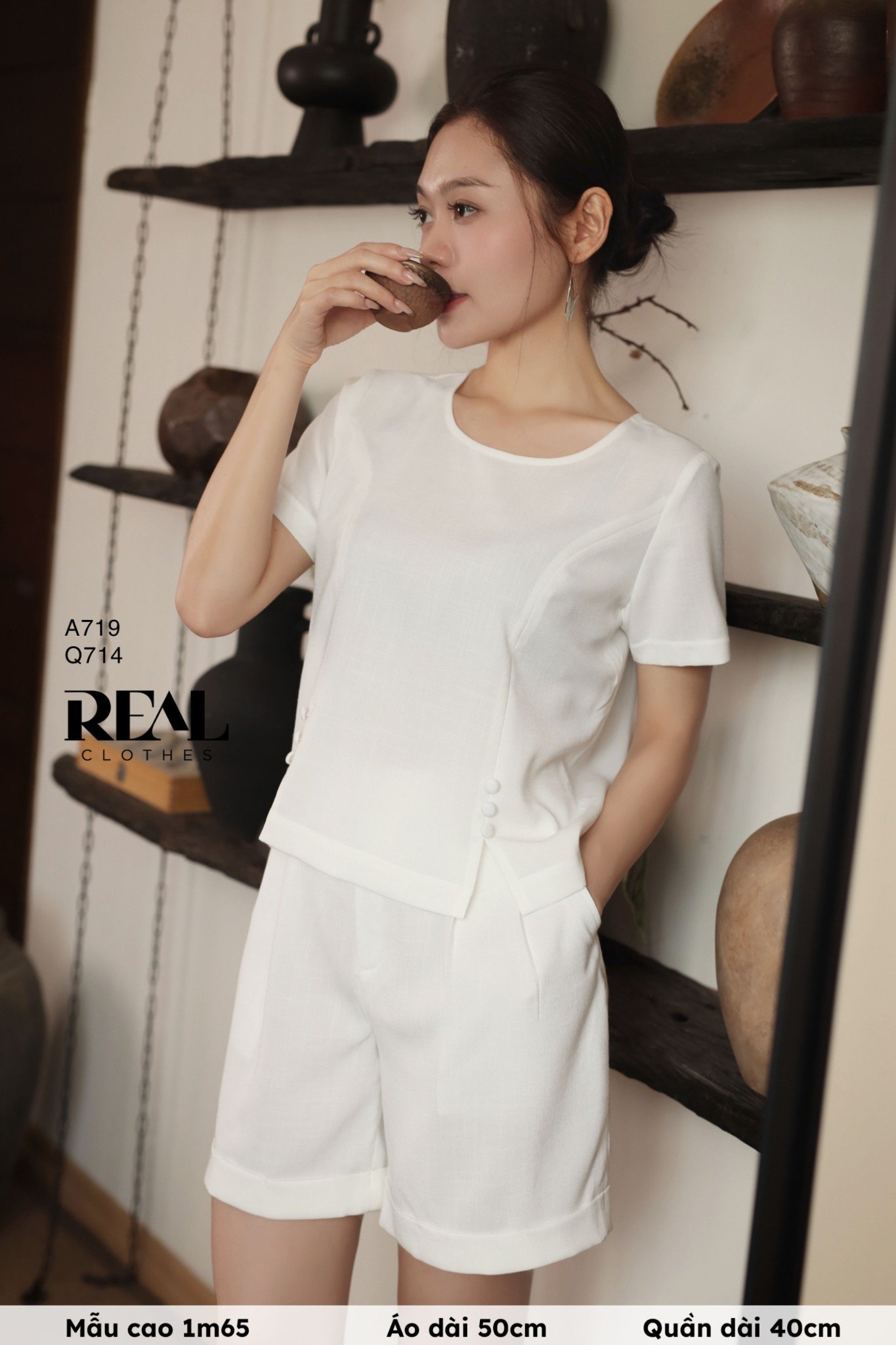 Áo xẻ tà linen trắng SALE