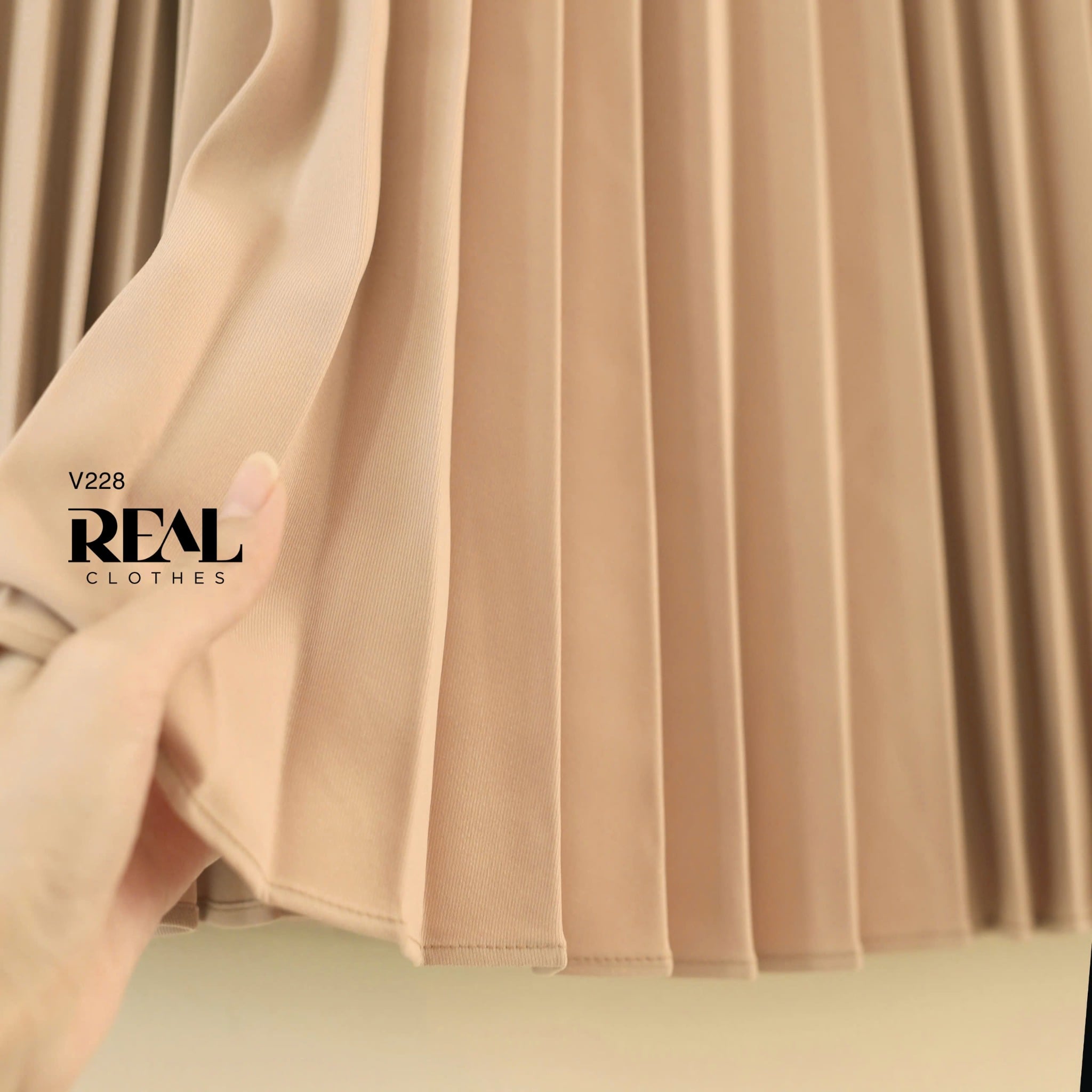 Váy pleated nude 75cm FINAL SALE