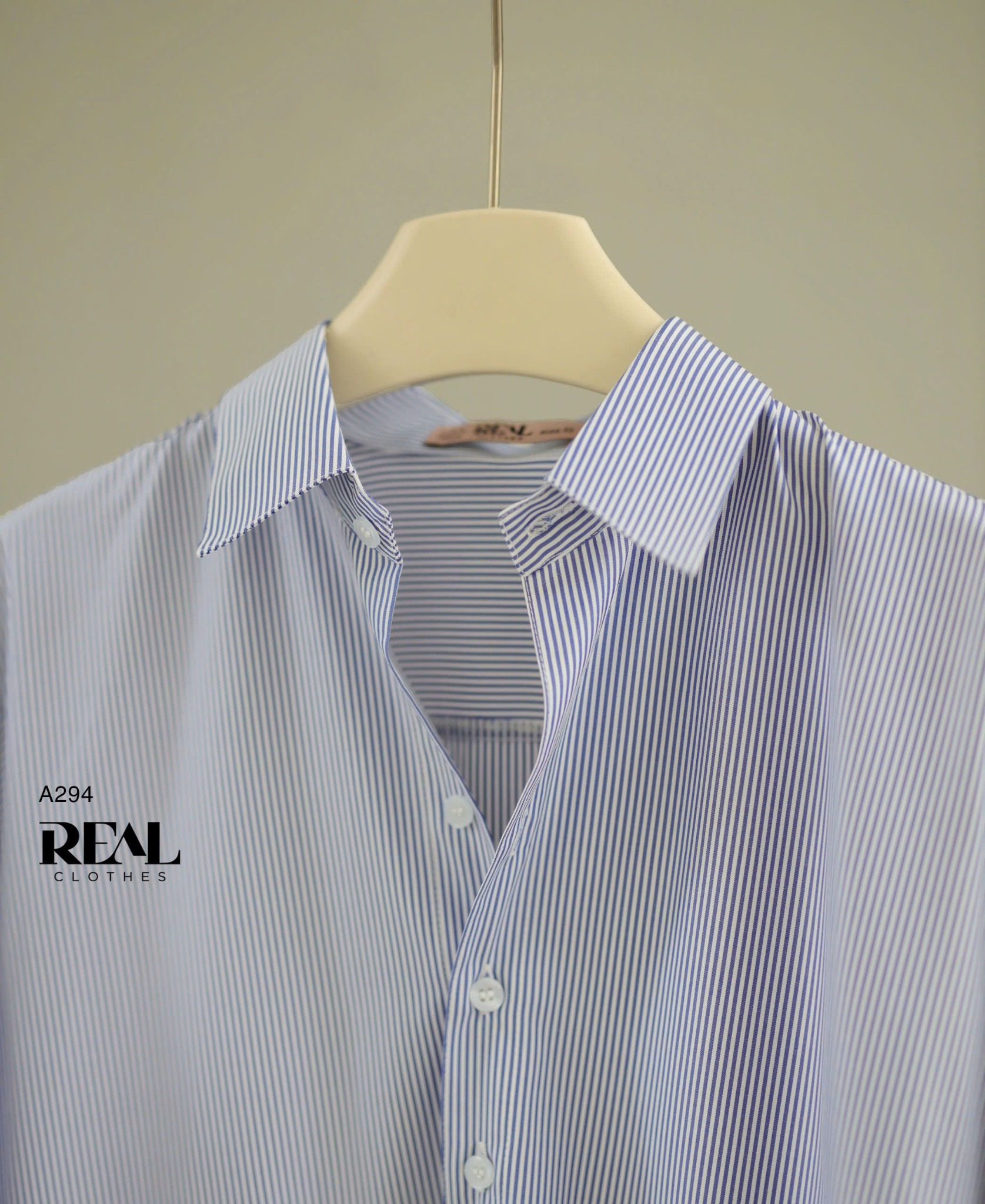 Sơ mi form rộng sọc xanh SALE