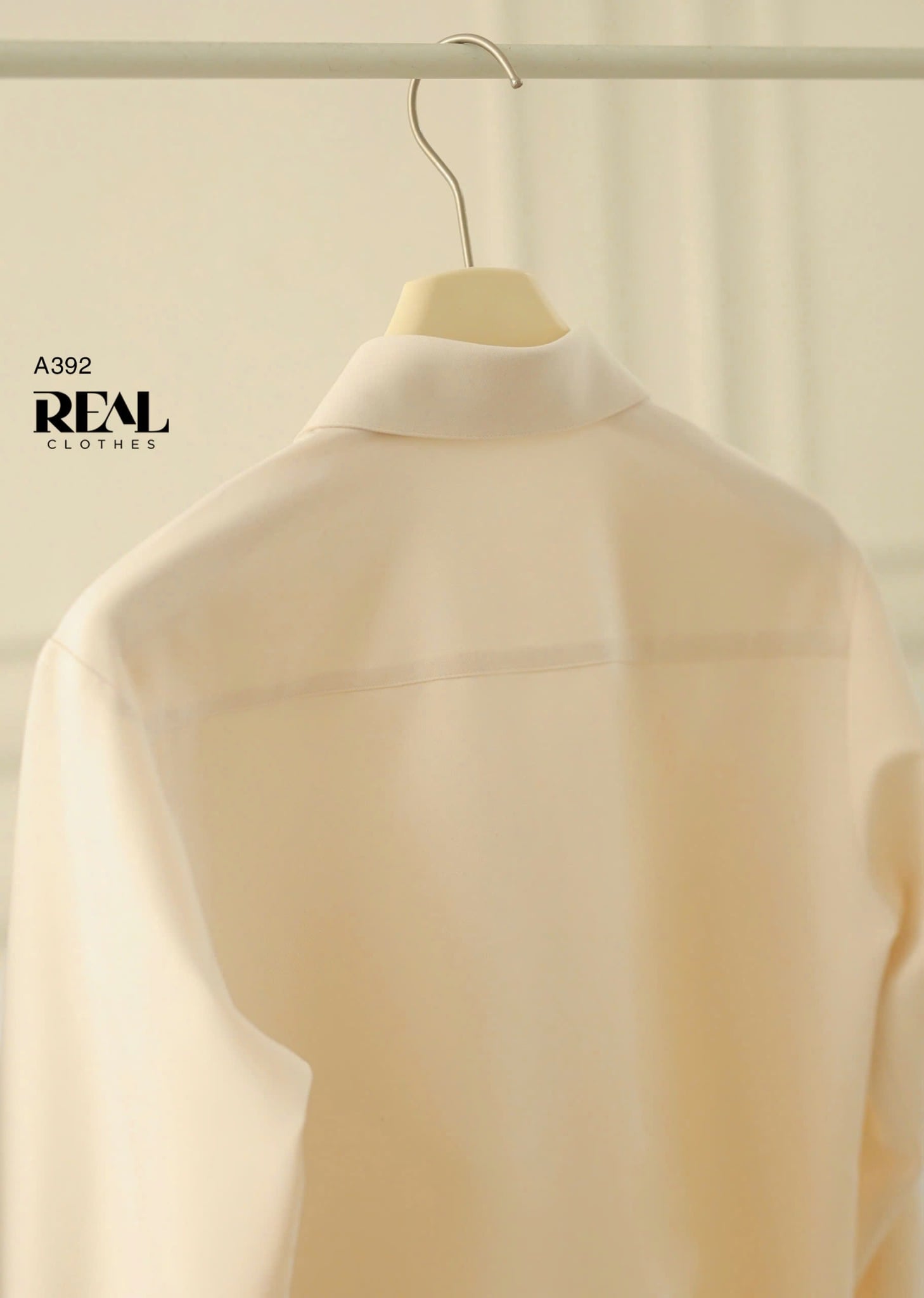 Sơ mi form rộng kem SALE