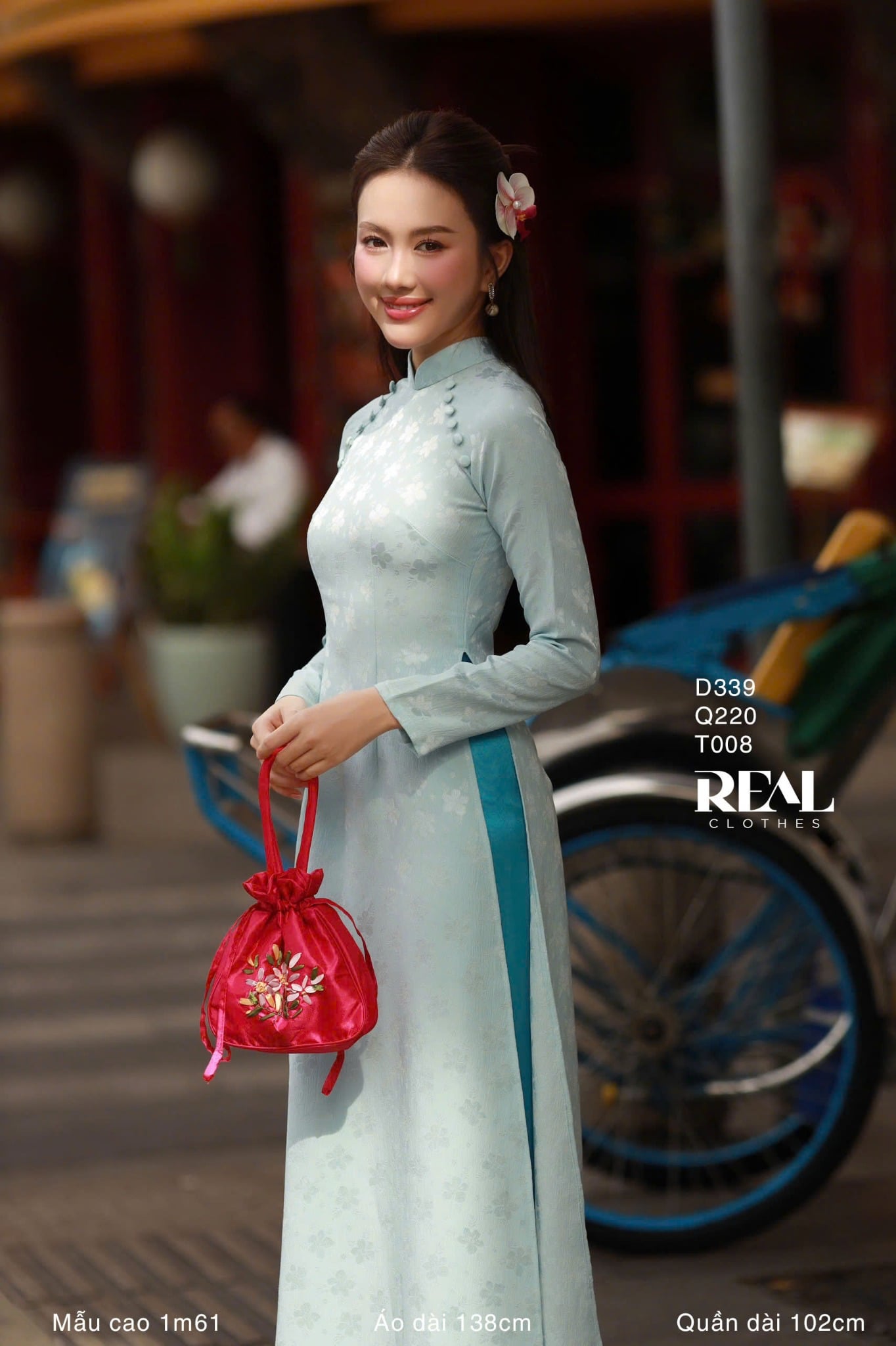 Áo dài truyền thống Nhã An lụa lam tay dài