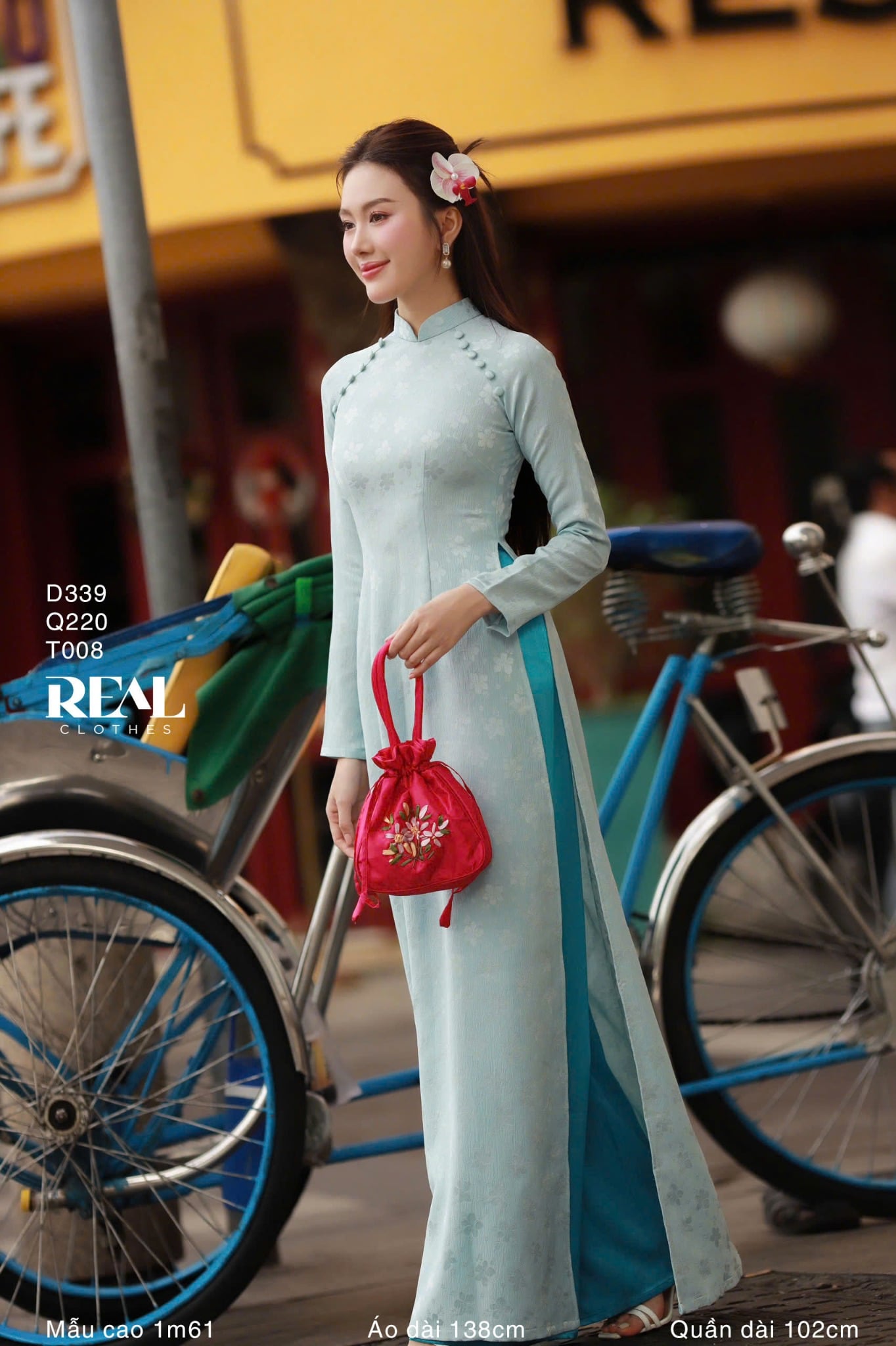 Áo dài truyền thống Nhã An lụa lam tay dài