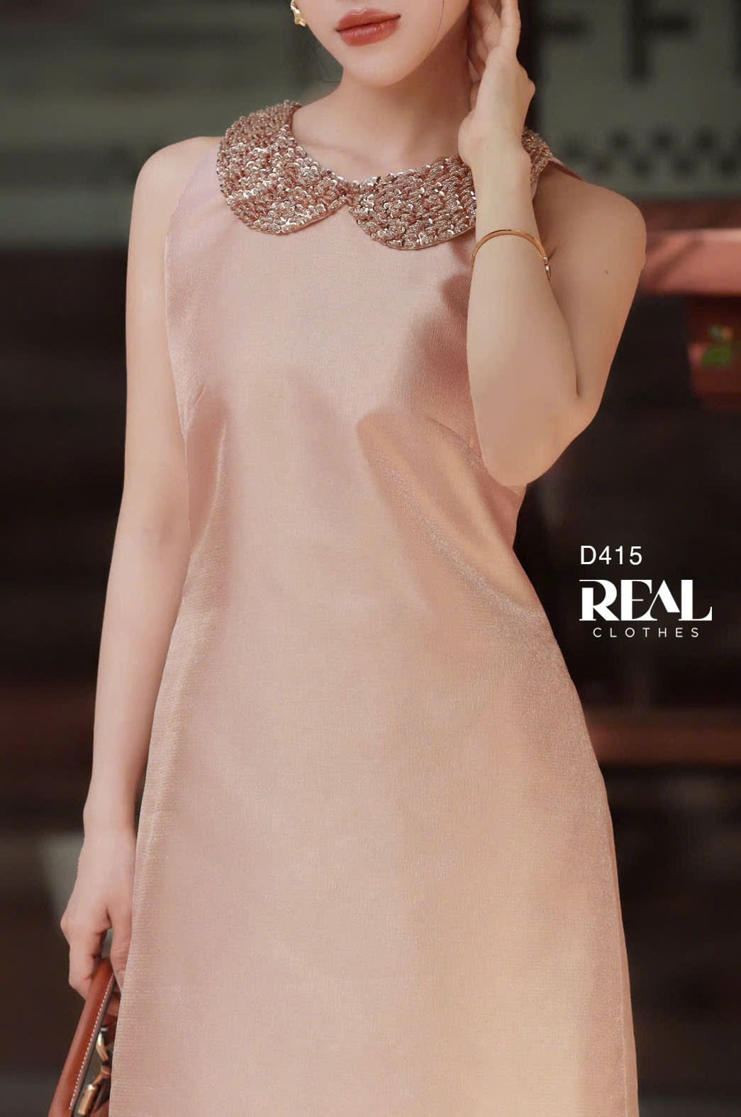 Đầm ánh cam cổ lá sen