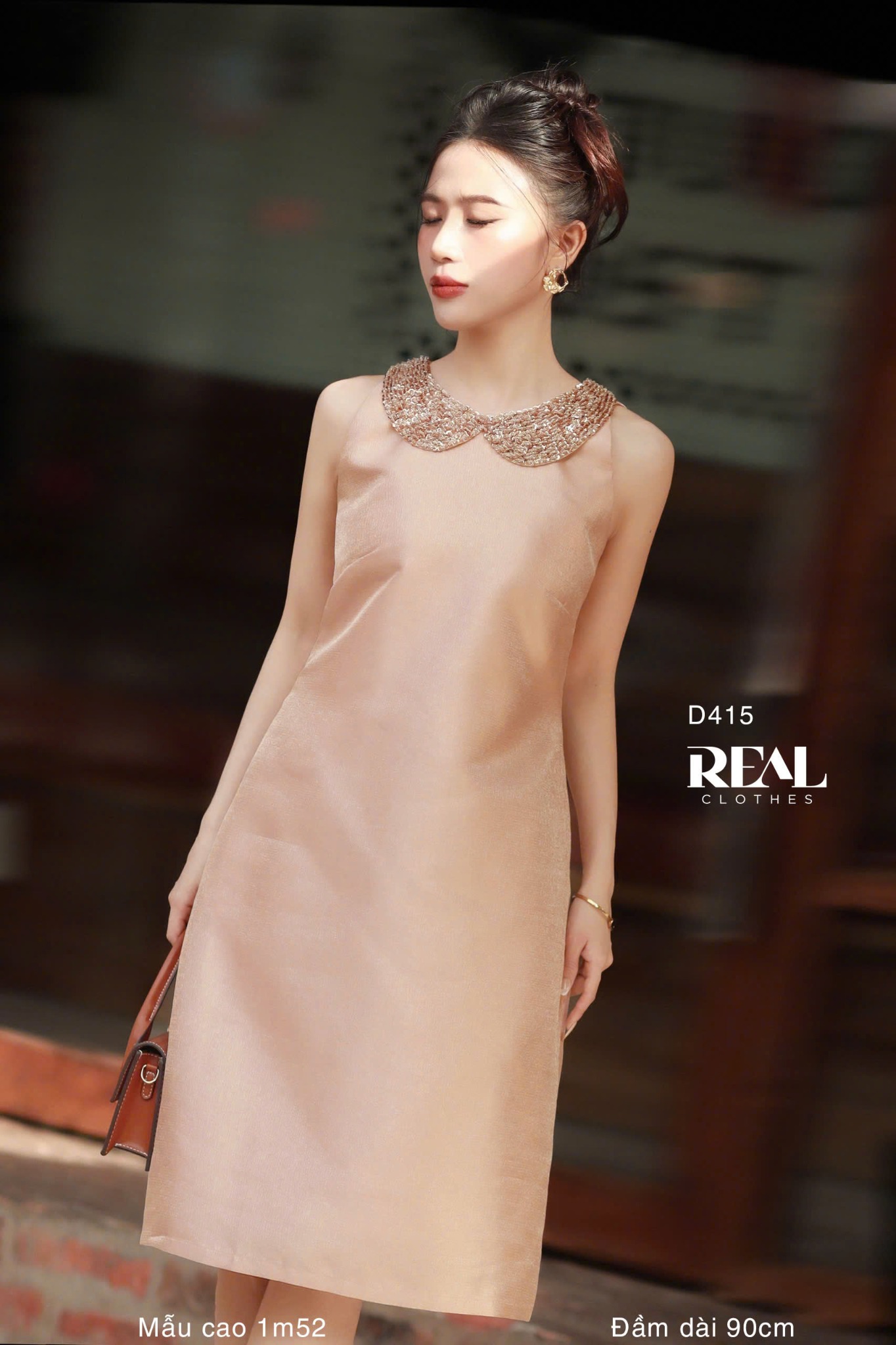 Đầm ánh cam cổ lá sen