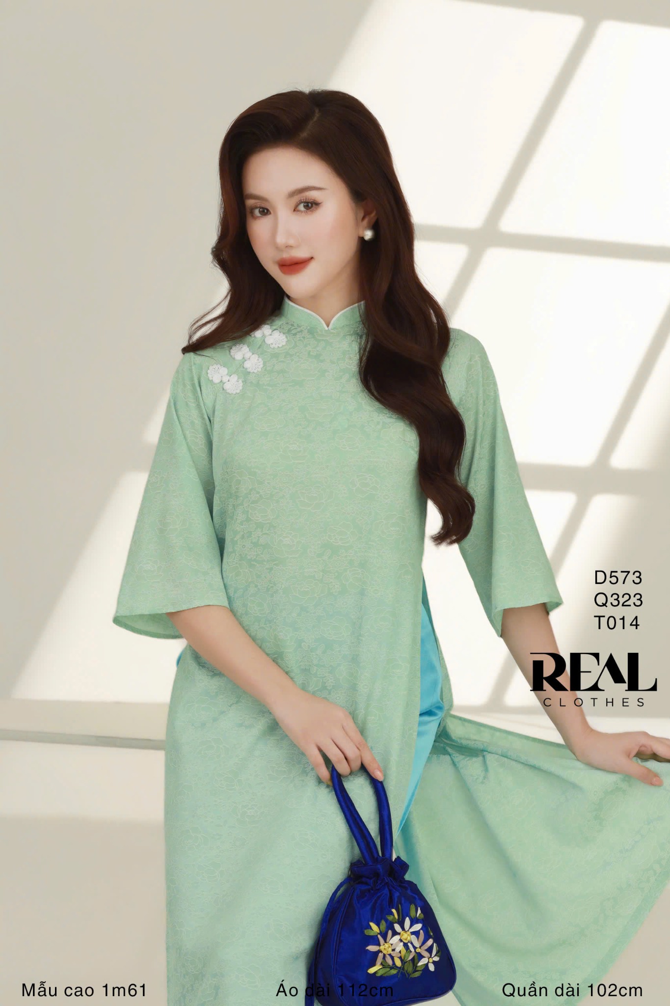 Áo dài cách tân nút hoa xanh mint