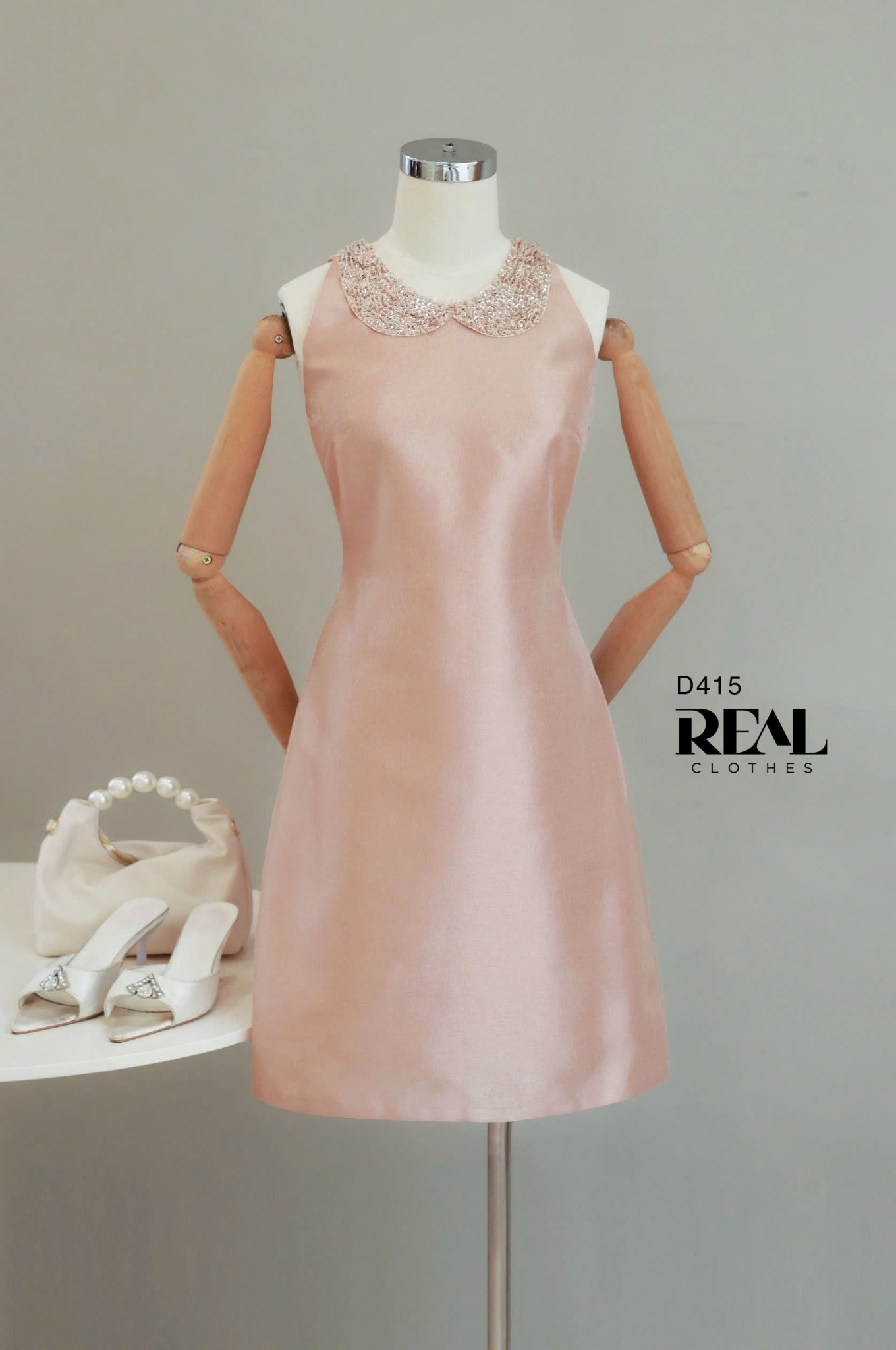 Đầm ánh cam cổ lá sen