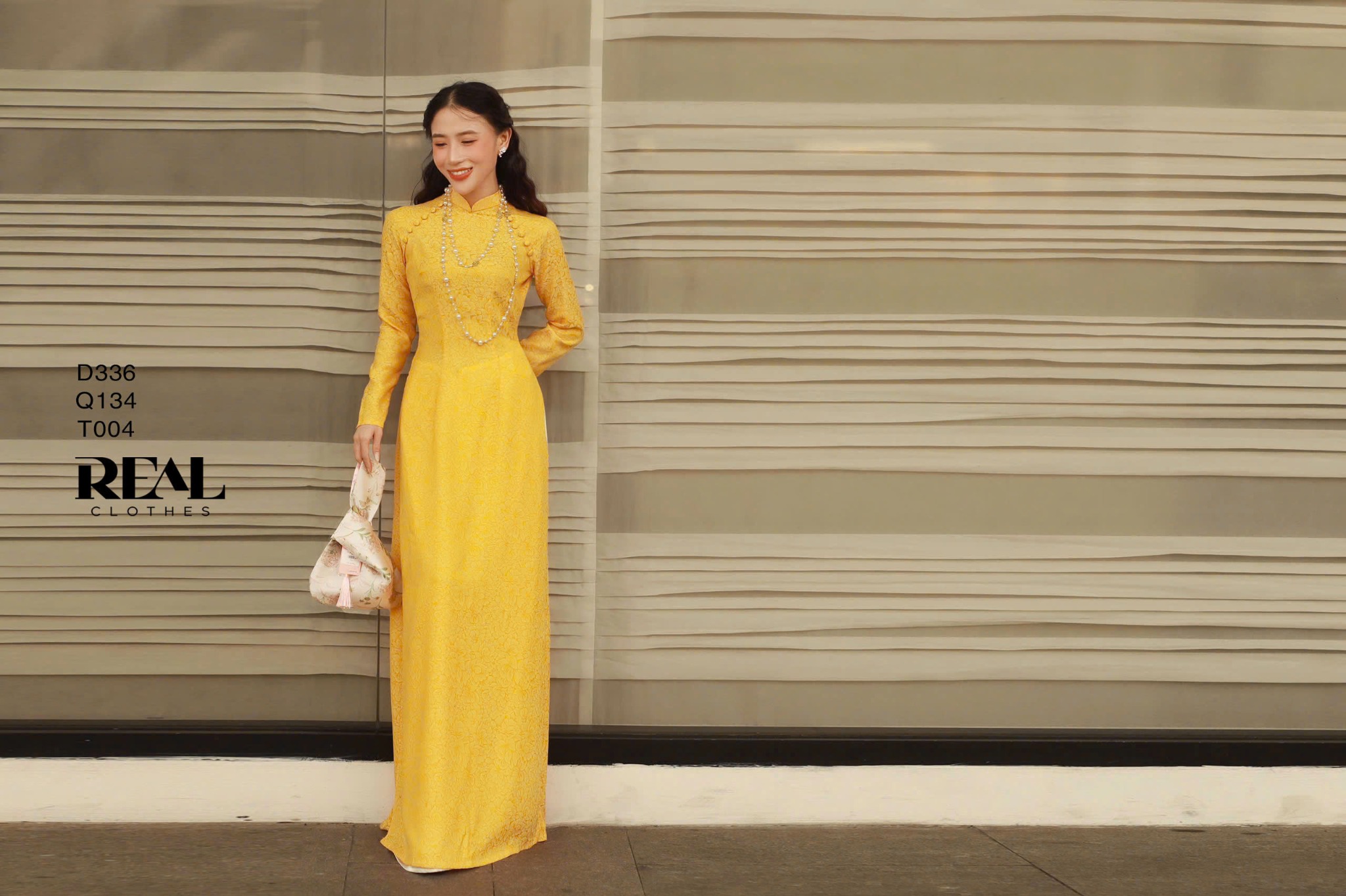 Áo dài truyền thống nhã an vàng tay dài