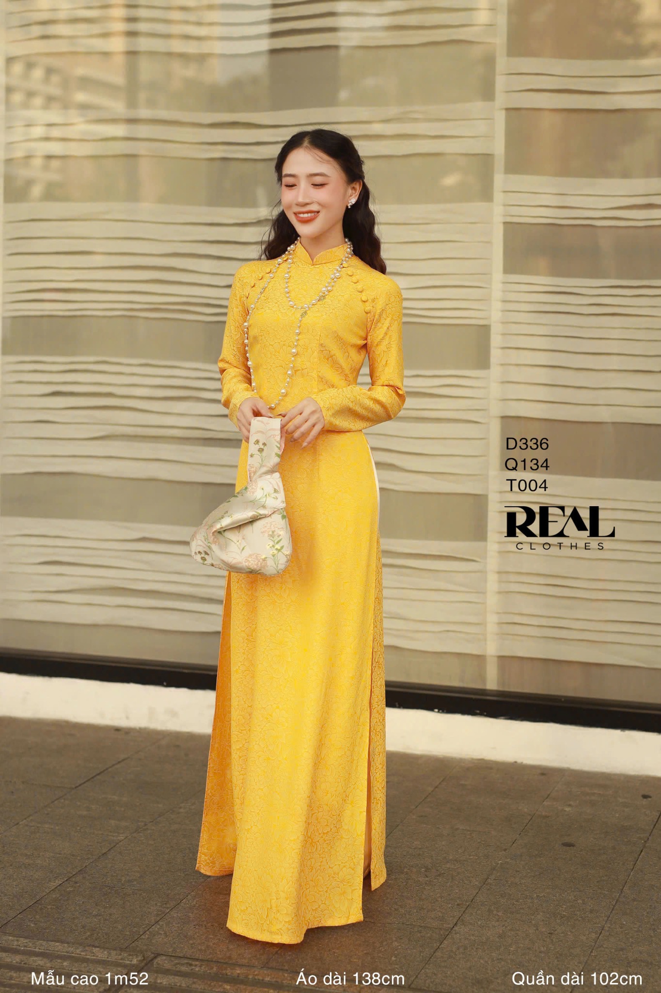 Áo dài truyền thống nhã an vàng tay dài