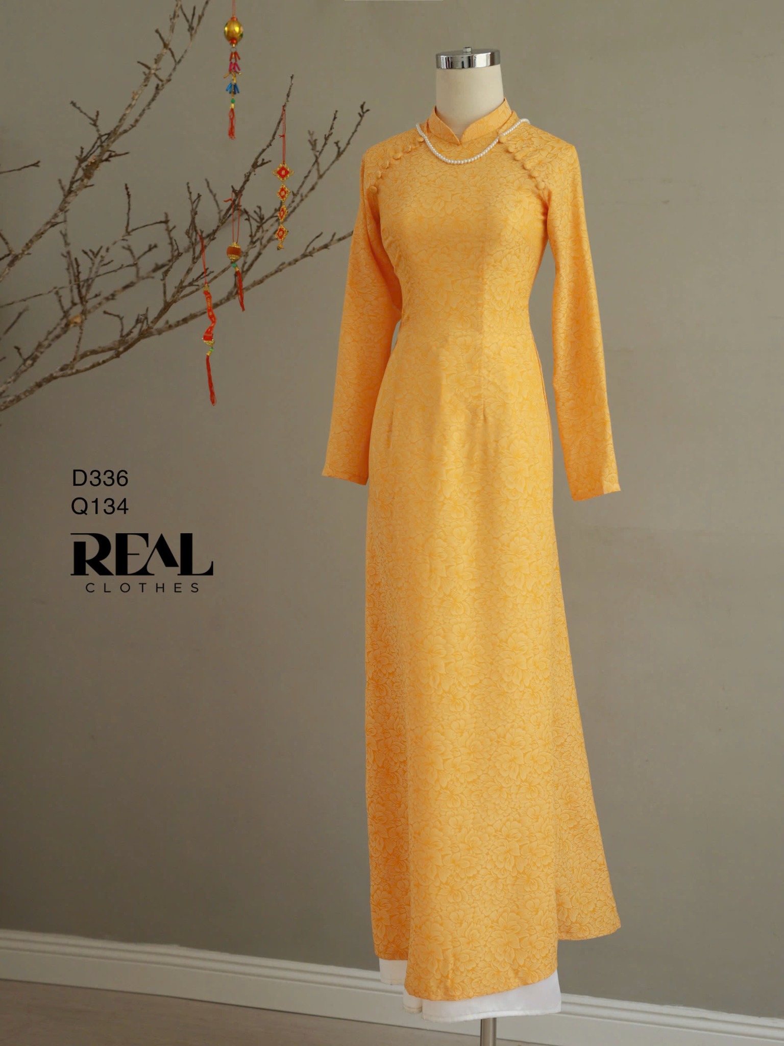 Áo dài truyền thống nhã an vàng tay dài